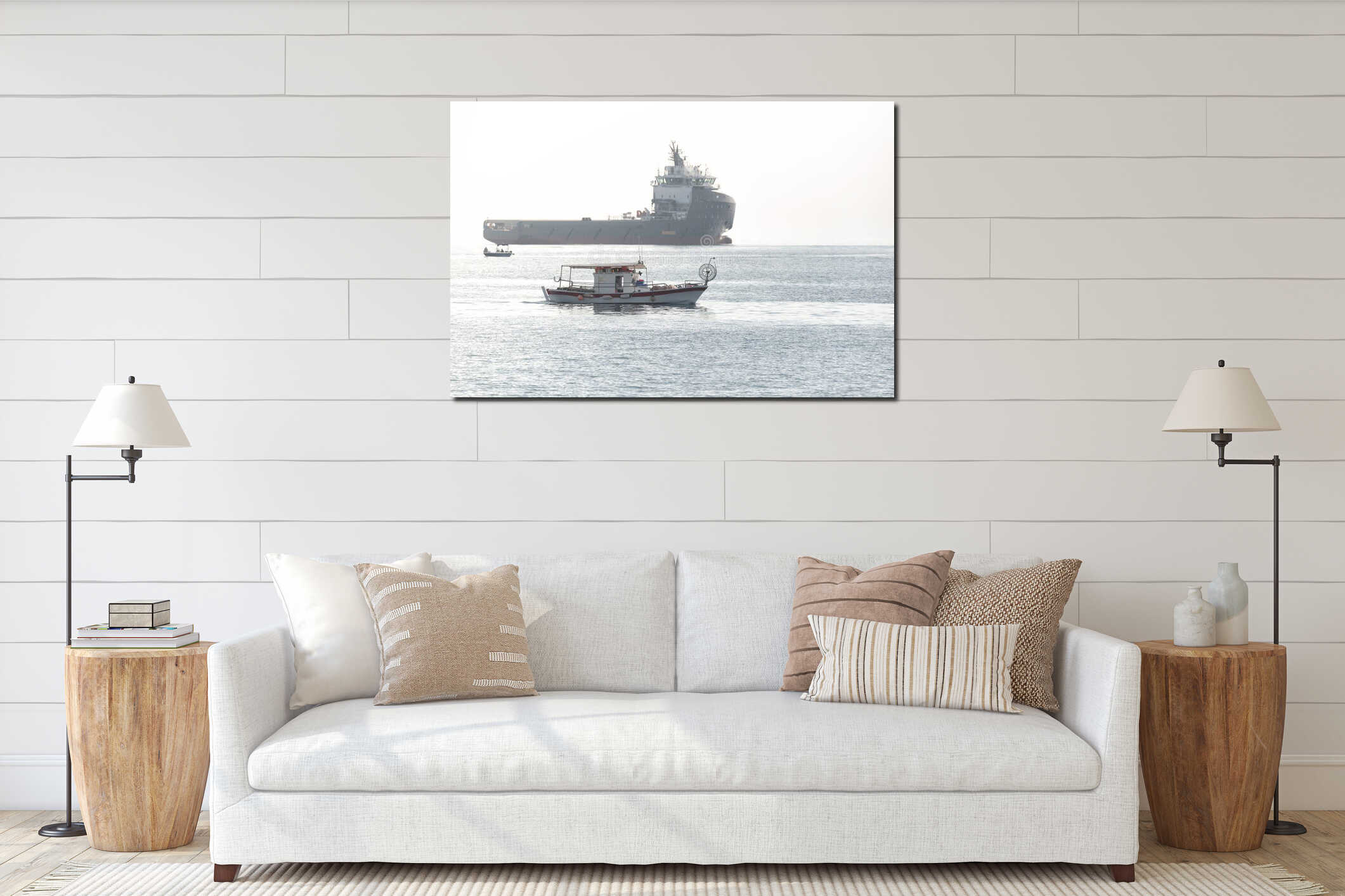 Small traditional Cypriot fishing boat sailing near a big cargo ship in the sea at Akrotiri Bay, Cyprus interior mockup