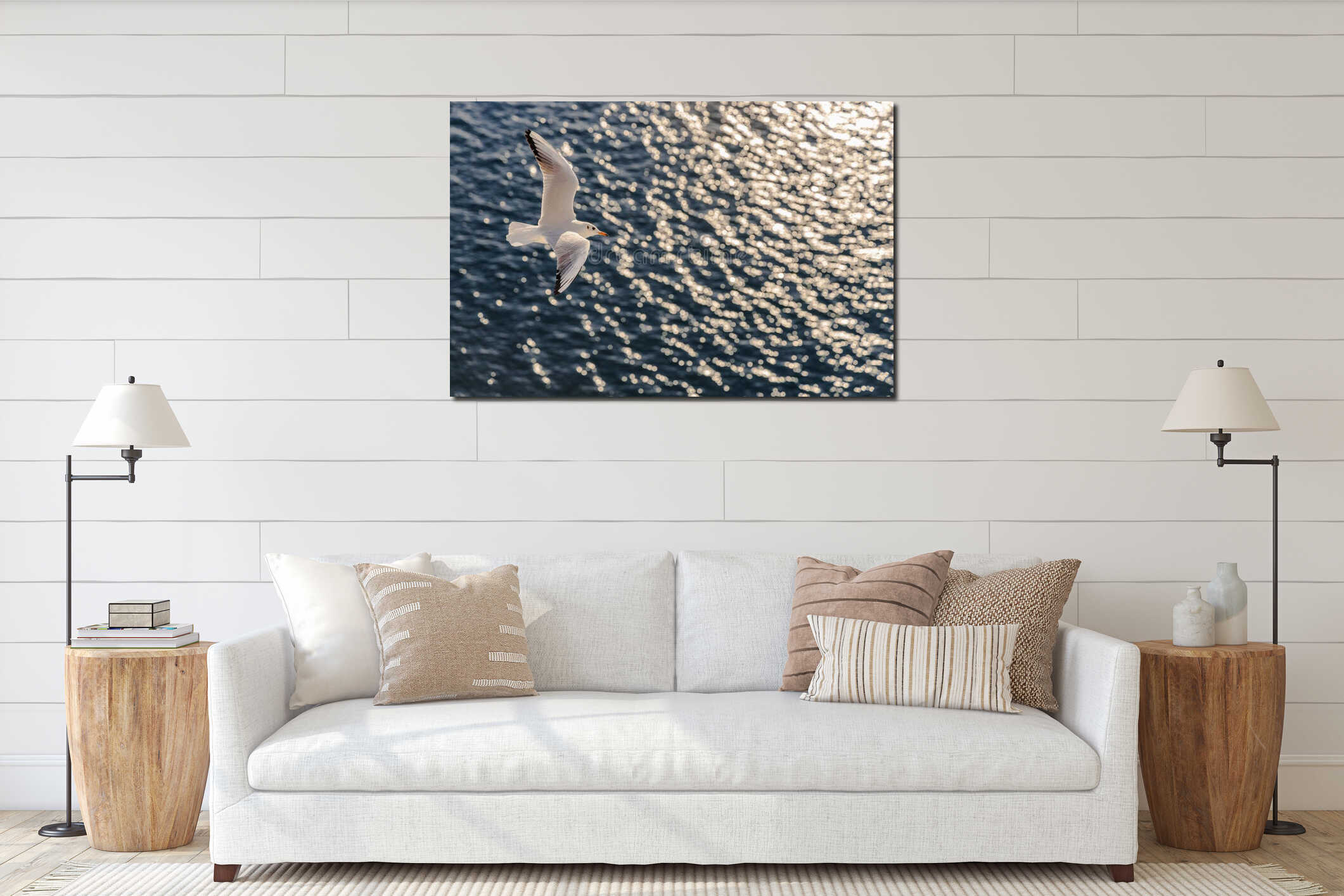 Seagull flying gracefully over the glistening ocean water interior mockup