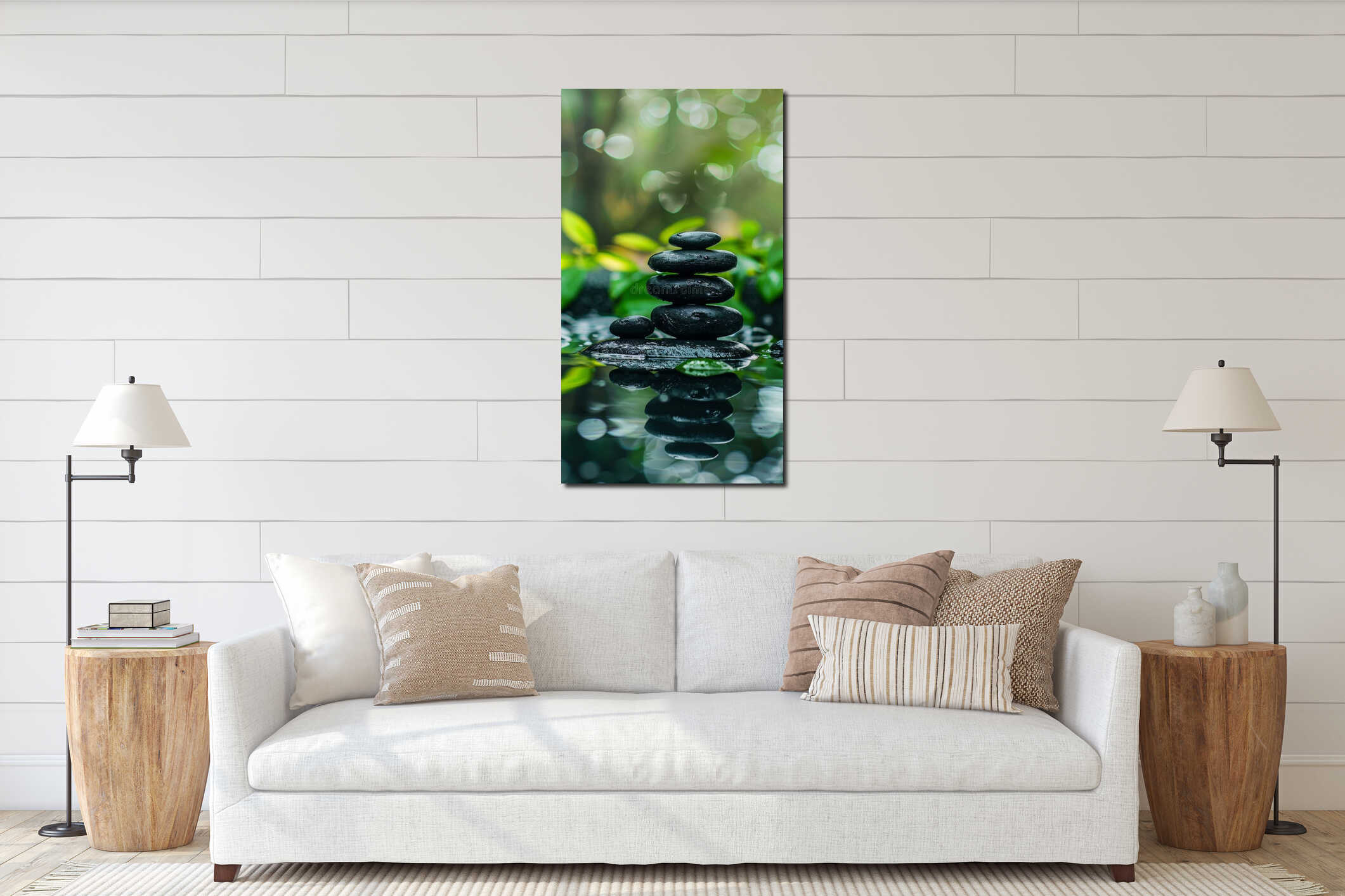 Stacked black stones in a natural setting, close-up view. Zen and relaxation concept interior mockup