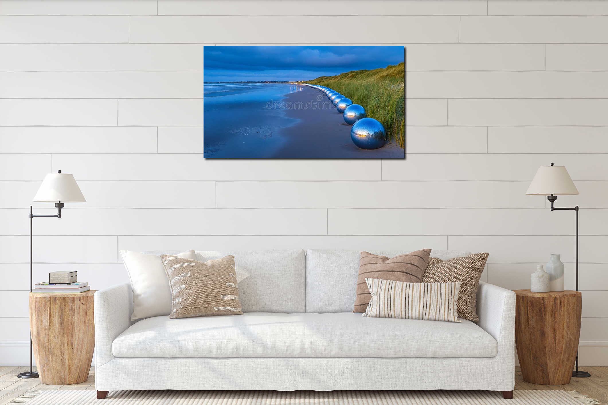 A row of blue spheres sitting on top of a sandy beach interior mockup