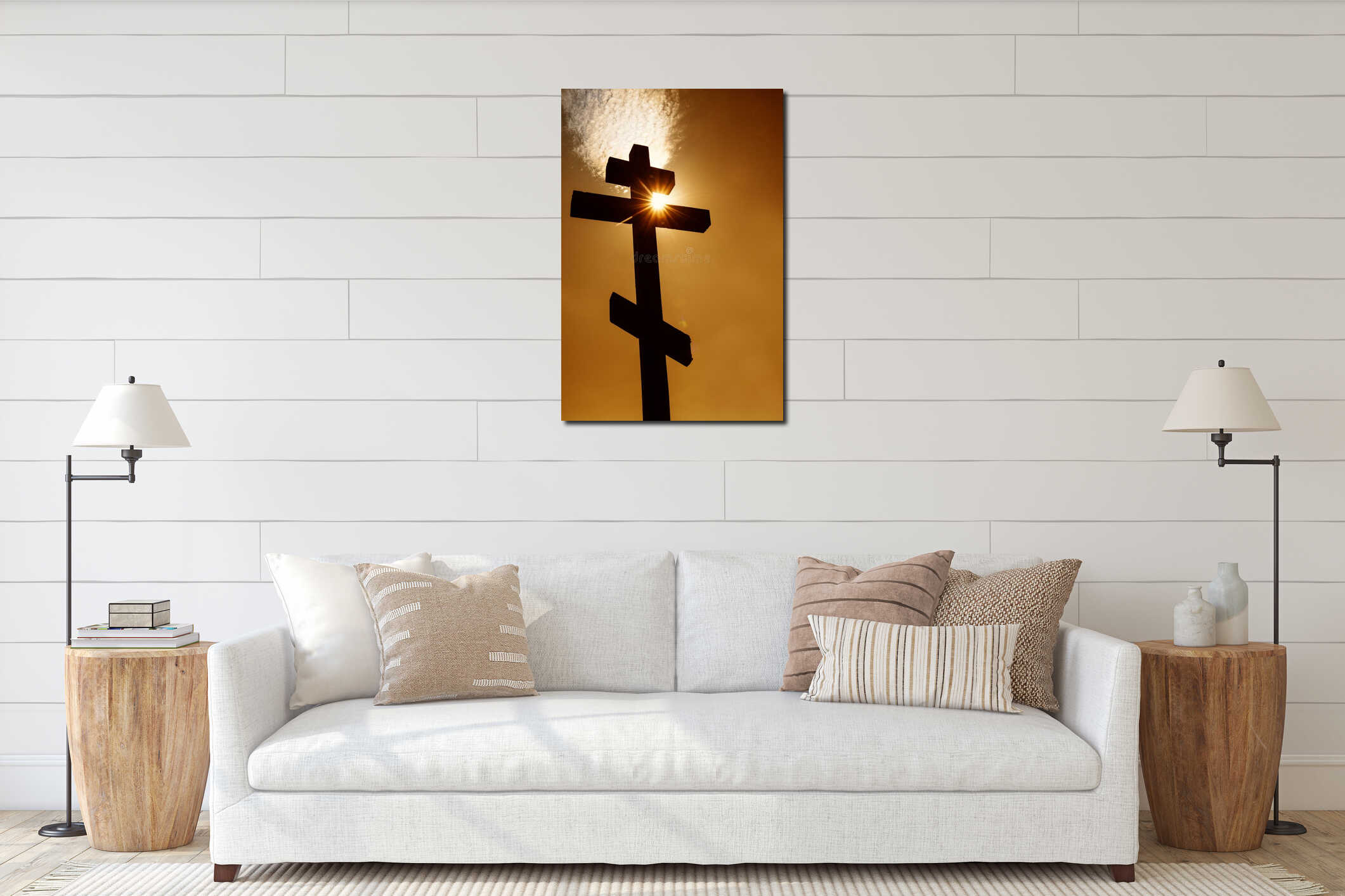 orthodox christian wooden cross against orange sky and sun rays through the cross. Silhouette interior mockup