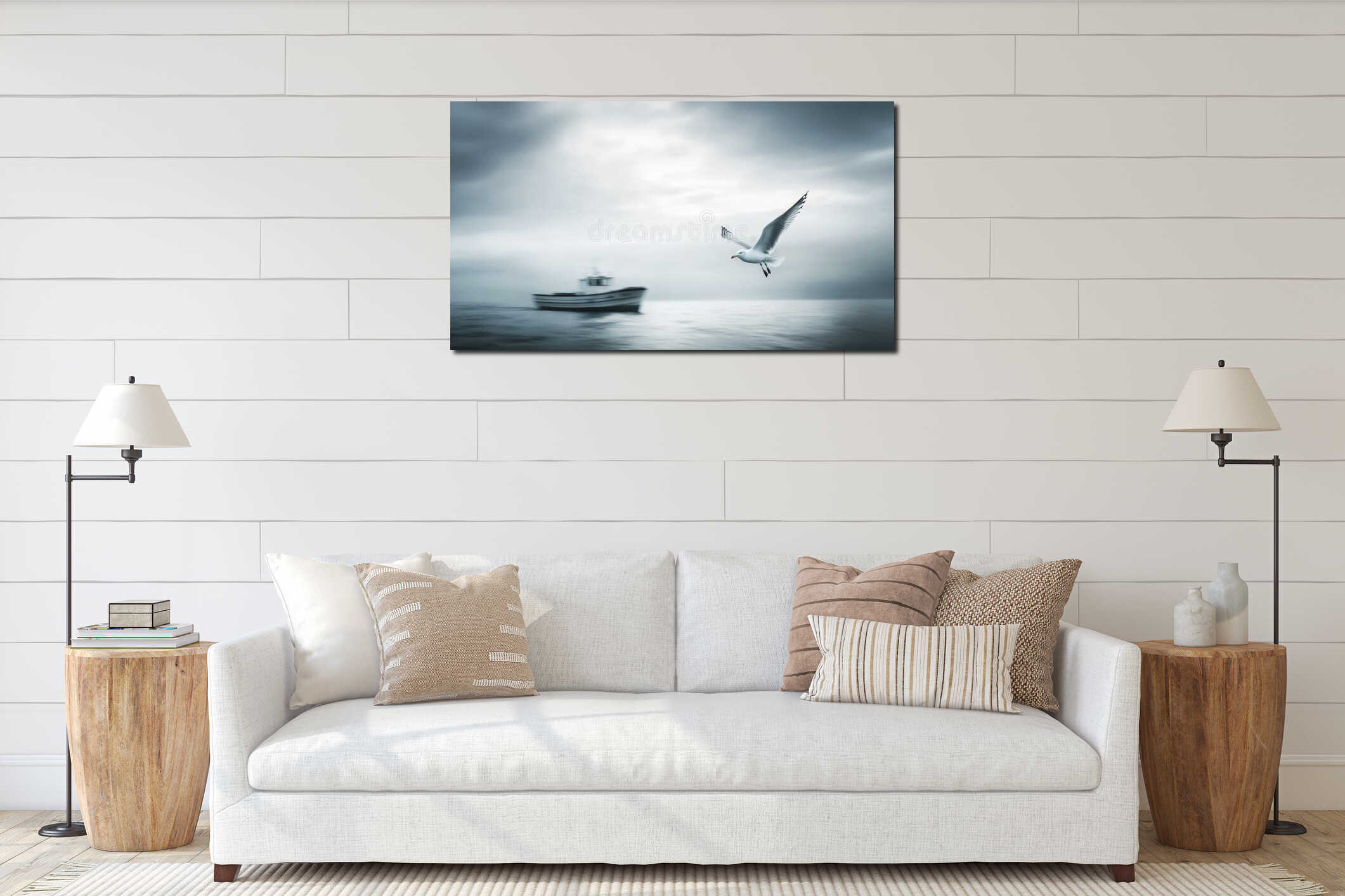 Seagull flying over a calm ocean with a fishing boat in the distance on a cloudy day interior mockup