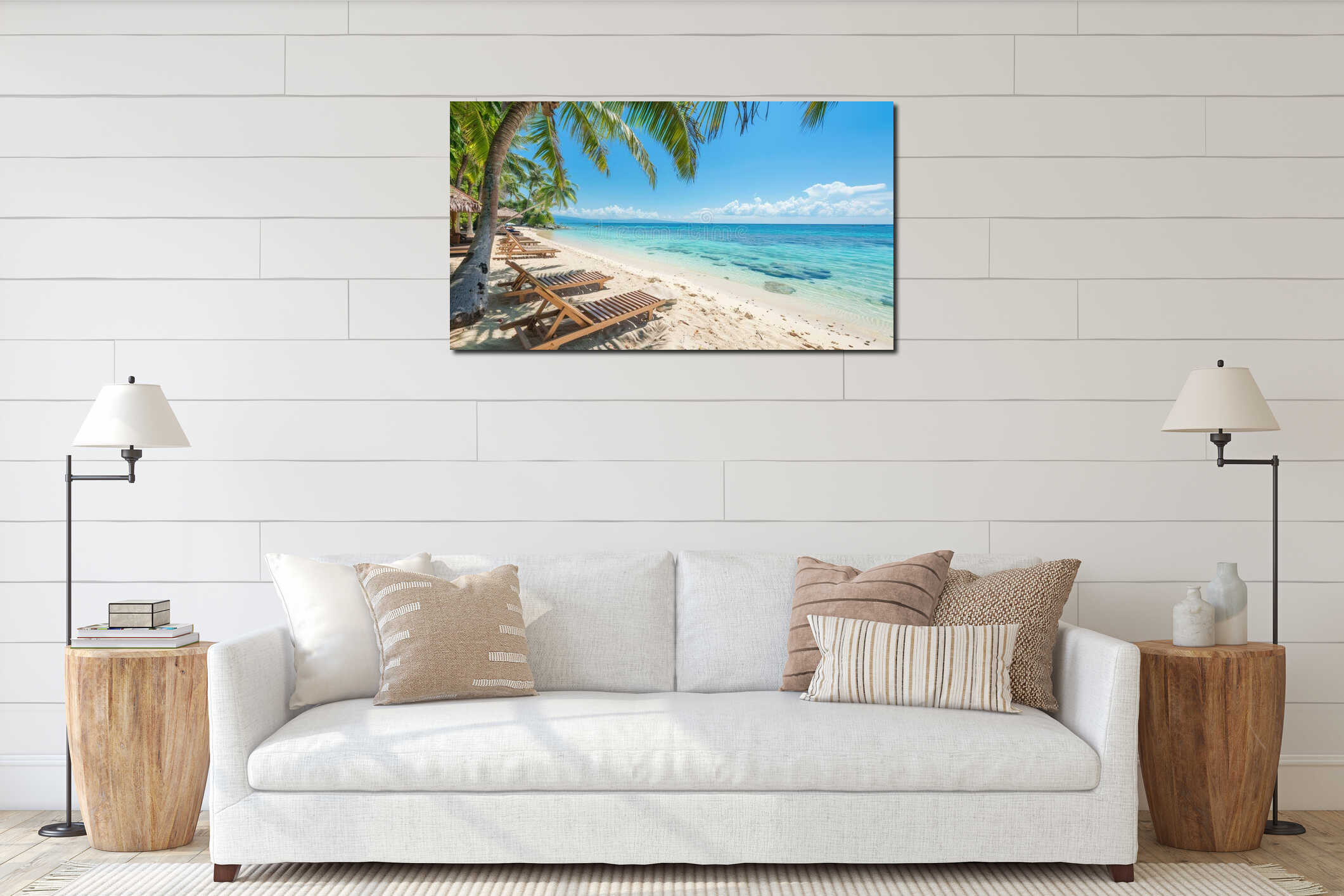 Tropical paradise beach featuring sun loungers and clear blue water interior mockup