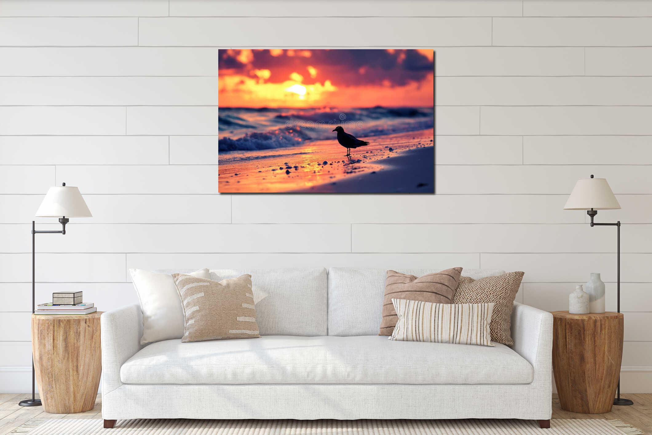 Seagull standing on the beach at sunset with ocean waves interior mockup