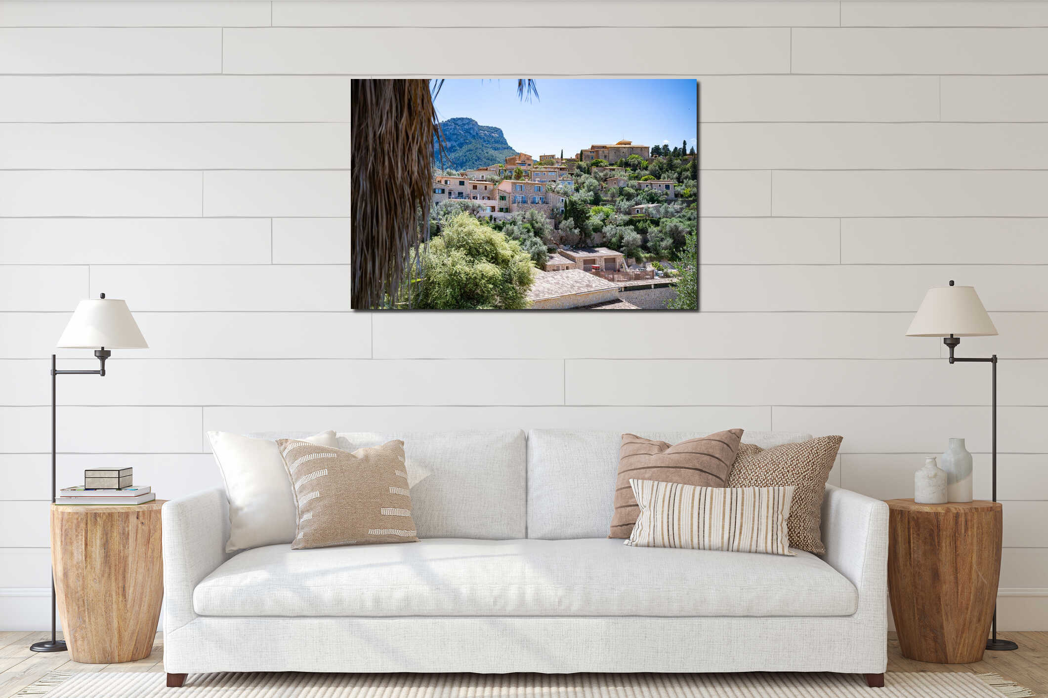 Scenic view of a hillside village with traditional stone houses and lush greenery interior mockup