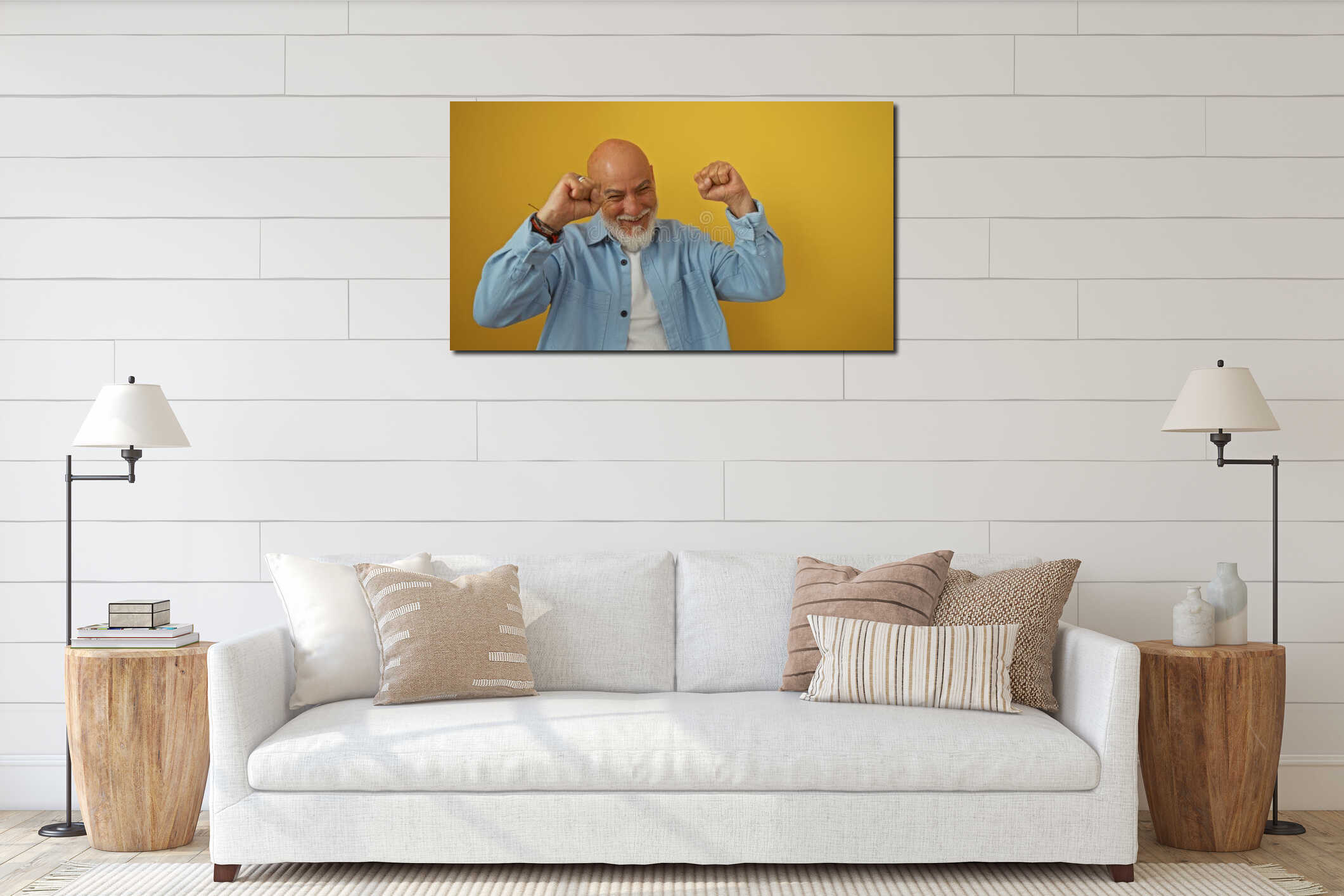 Handsome mature man with grey hair and beard smiling over a yellow background in a triumphant pose interior mockup
