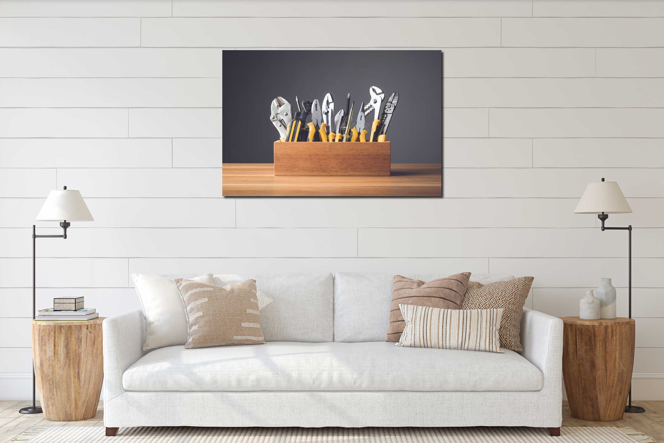 Set of tools for repair concept. Several yellow metal tools kit for self work in wooden box put on wooden desk with gray wall interior mockup