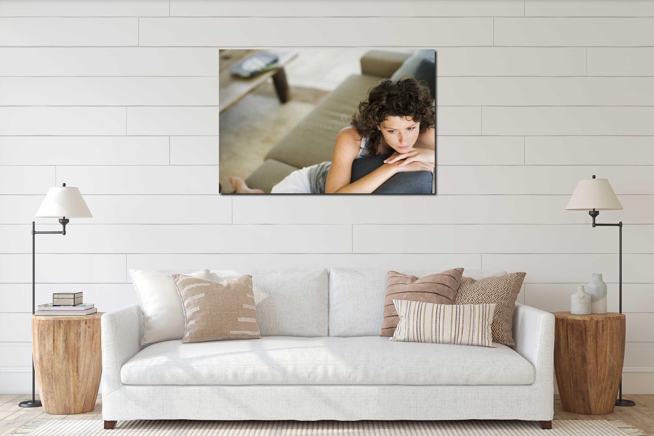 Thoughtful Young Woman Sitting On Couch interior mockup