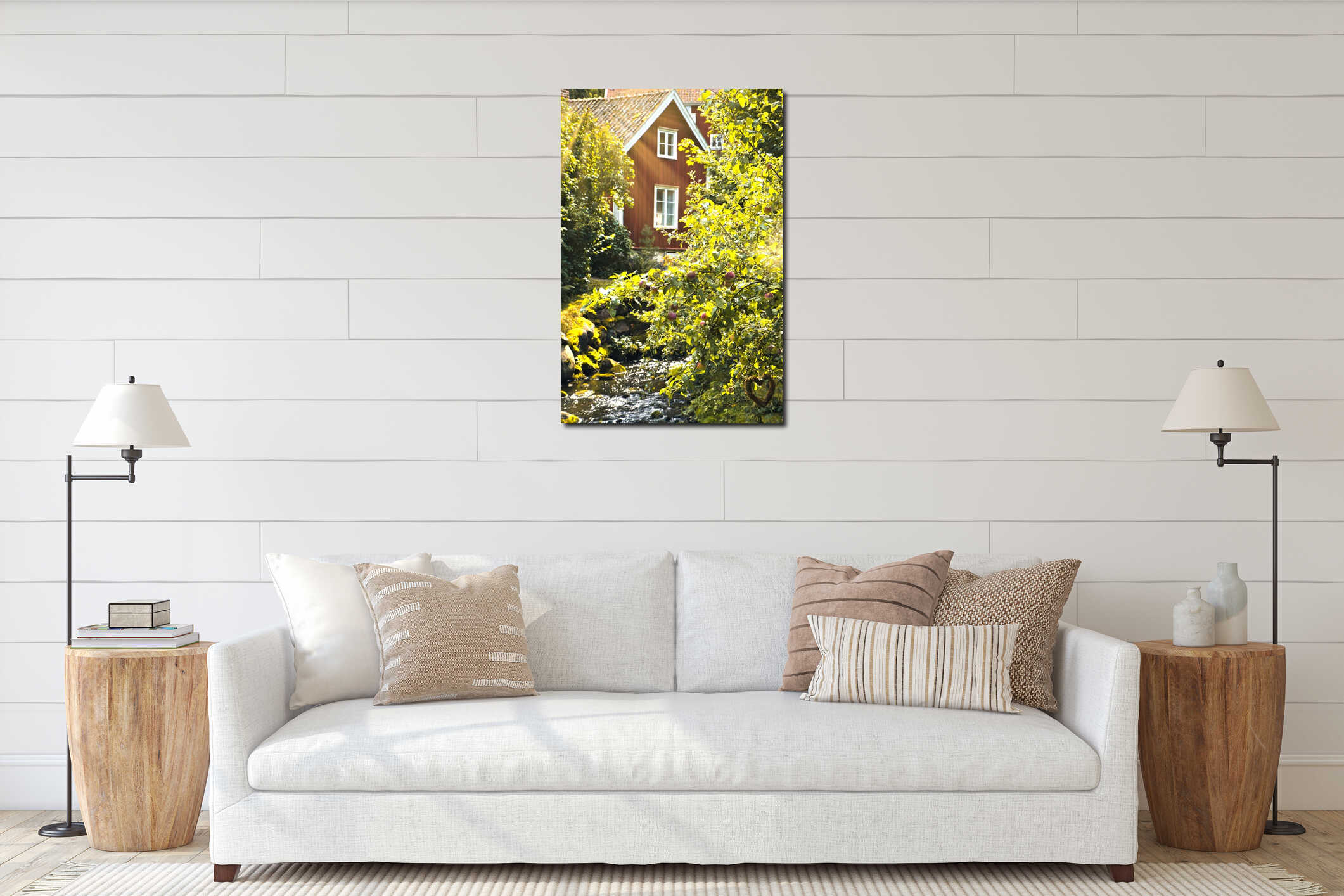 Apple tree with apples by a stream in front of a red Swedish house with garden interior mockup