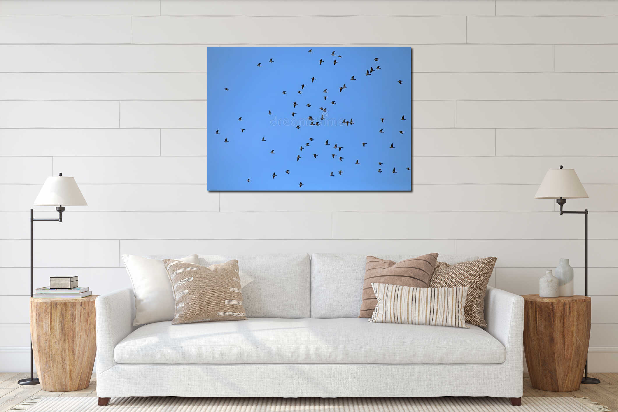 A large flock of wild doves flying on the blue sky. interior mockup