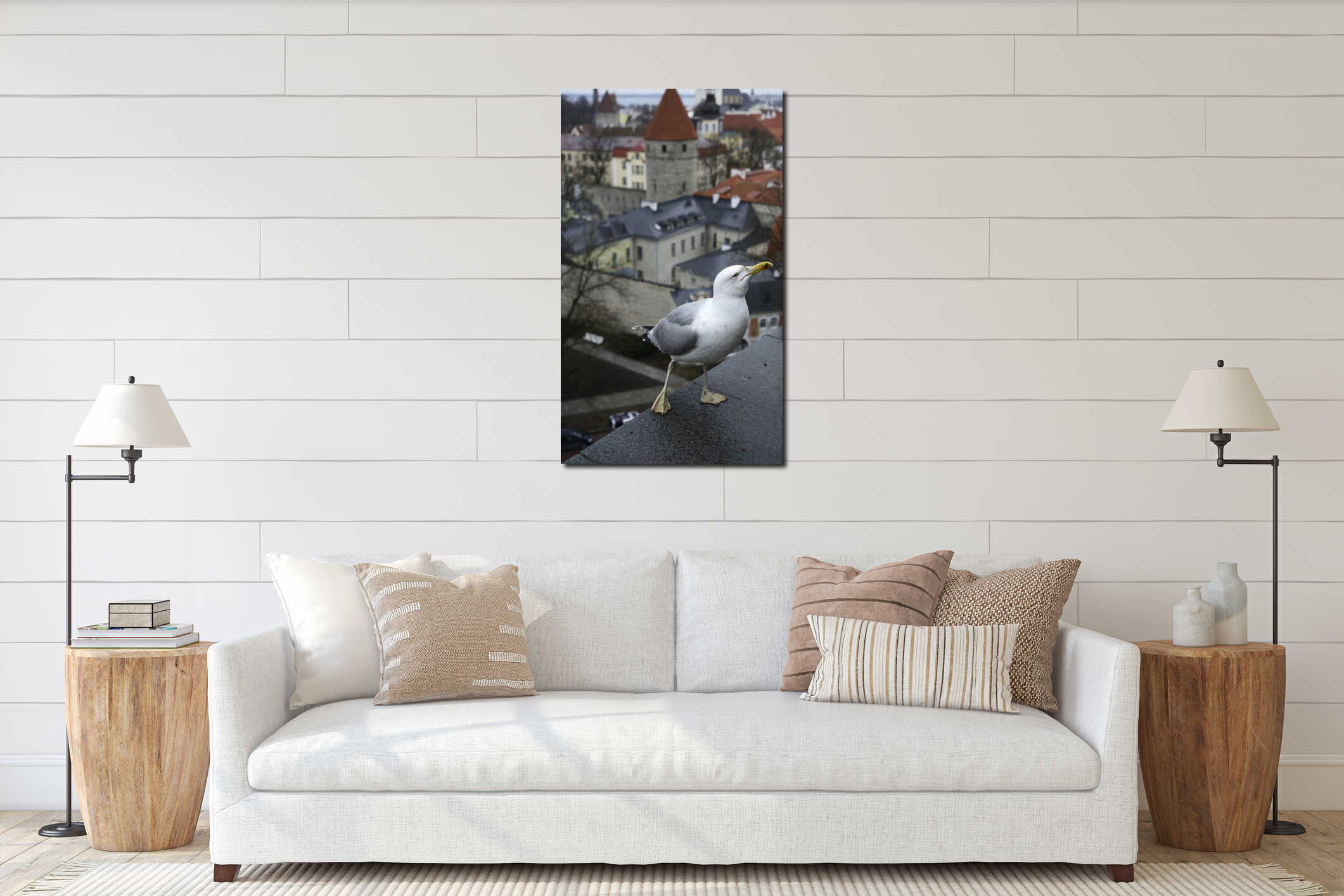 a close-up of a seagull perched on a ledge against the scenic backdrop of Tallinn's historic Old Town, Estonia interior mockup