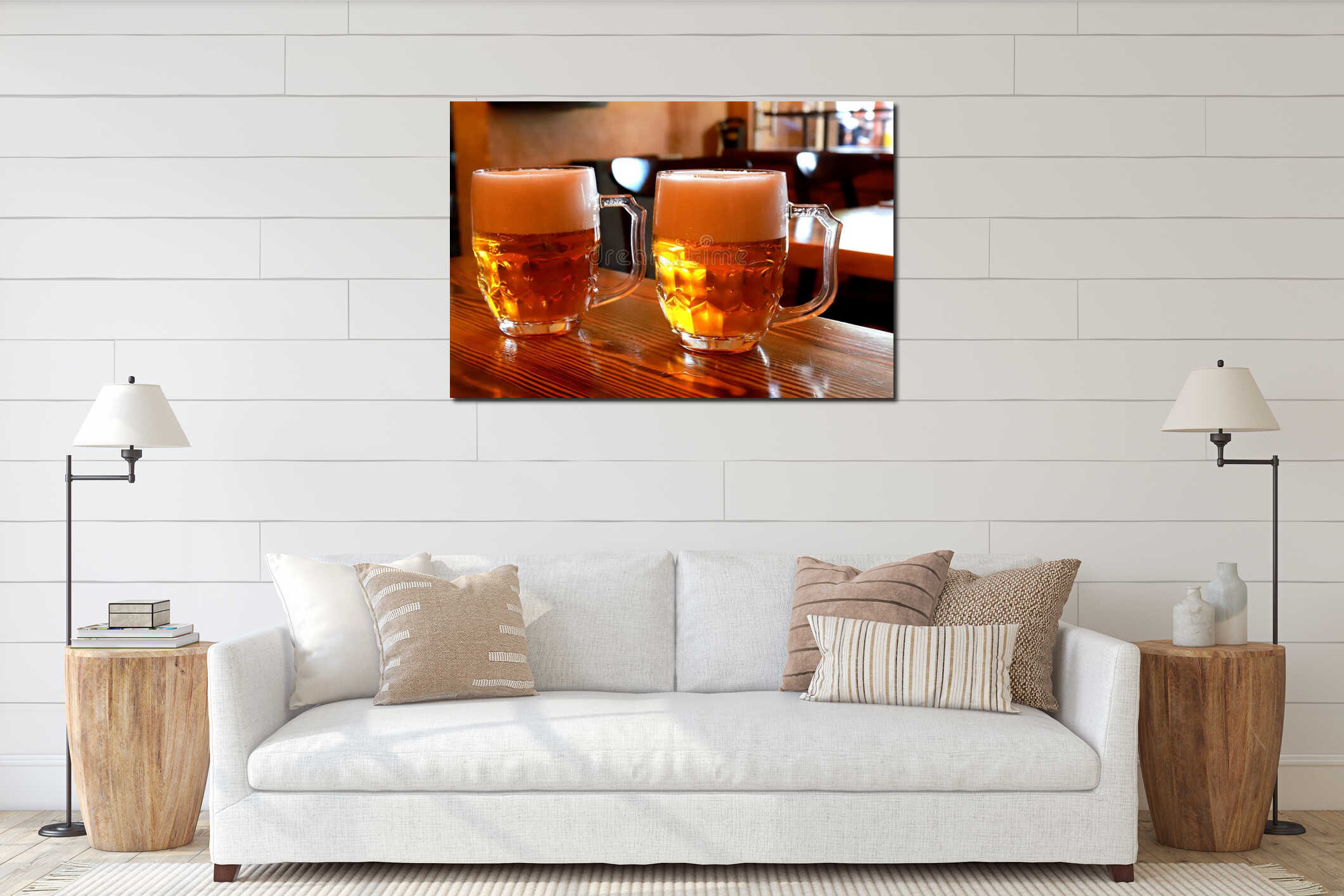 A glass of beer against background of blurred image of cafe, bar, restaurant, close-up. A foggy mug, glass of cold beer interior mockup