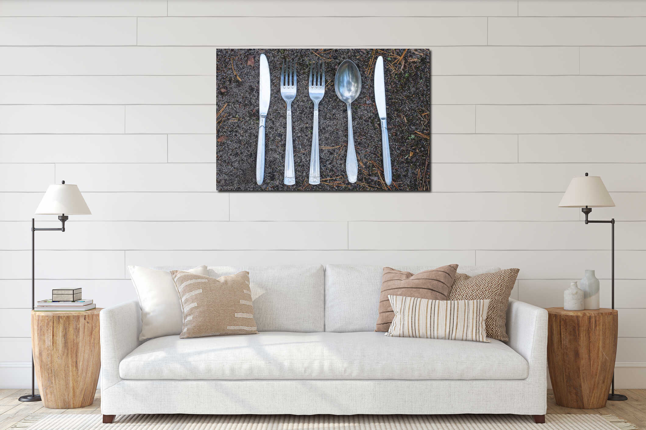 set of metal gray forks spoons and knives lie on the ground interior mockup