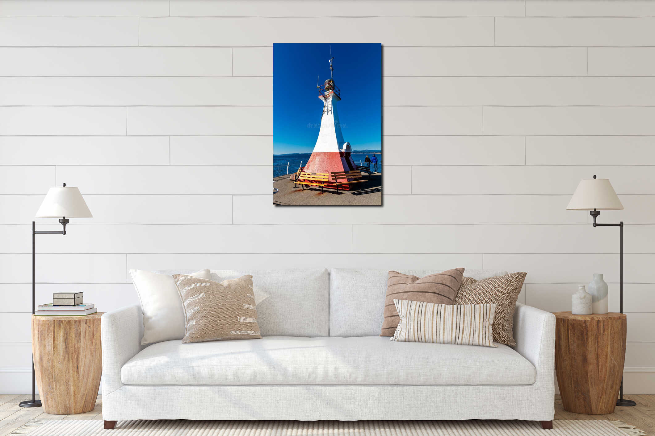 A tall white and red lighthouse with a bench and two people sitting on it interior mockup