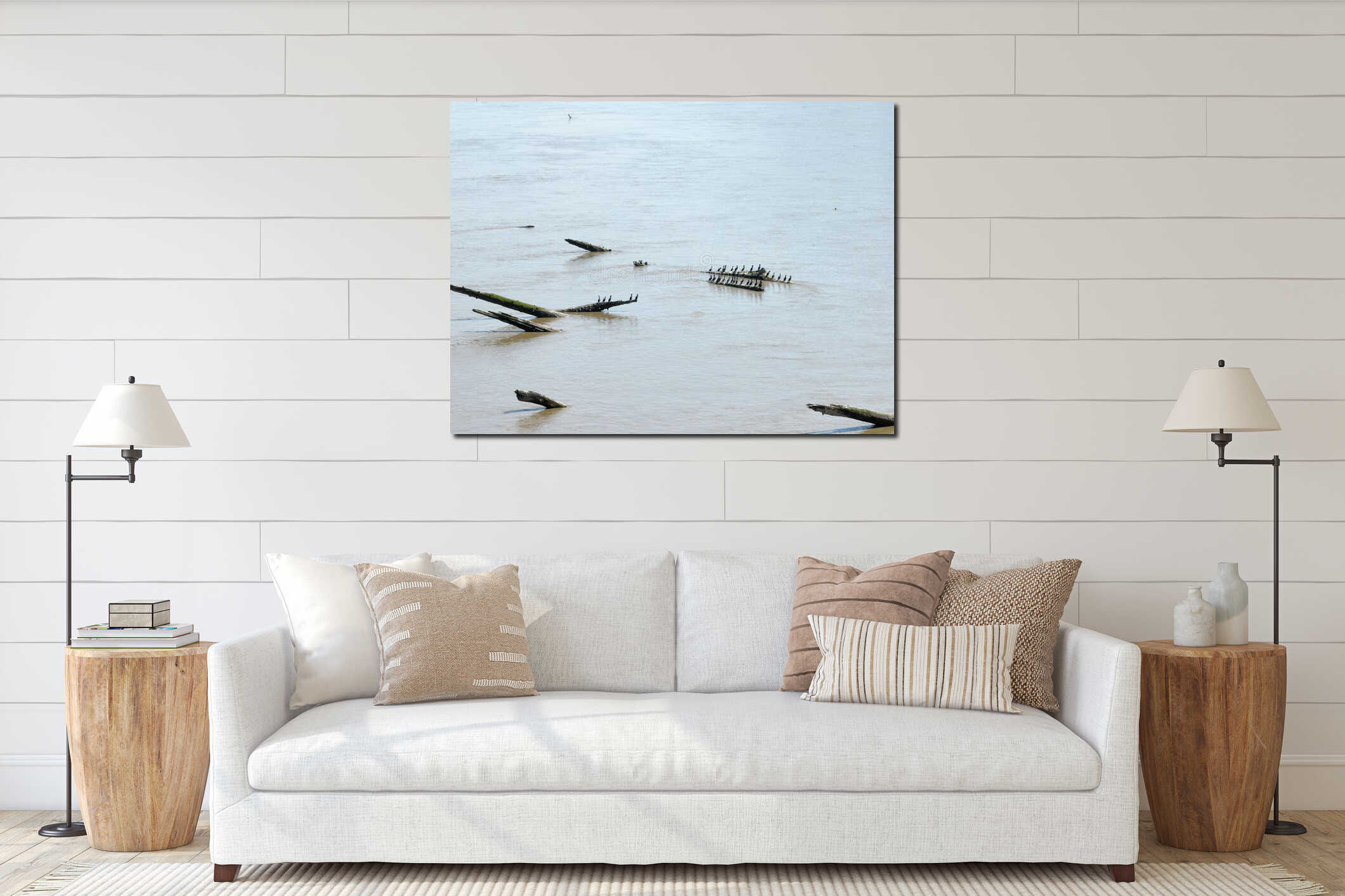 Aerial view of a flock of birds perched on a log in a lake interior mockup