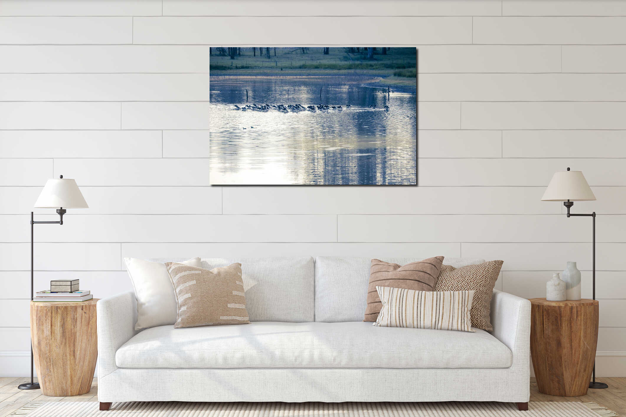 Pelicans feeding on a tranquil lake in a large meadow interior mockup