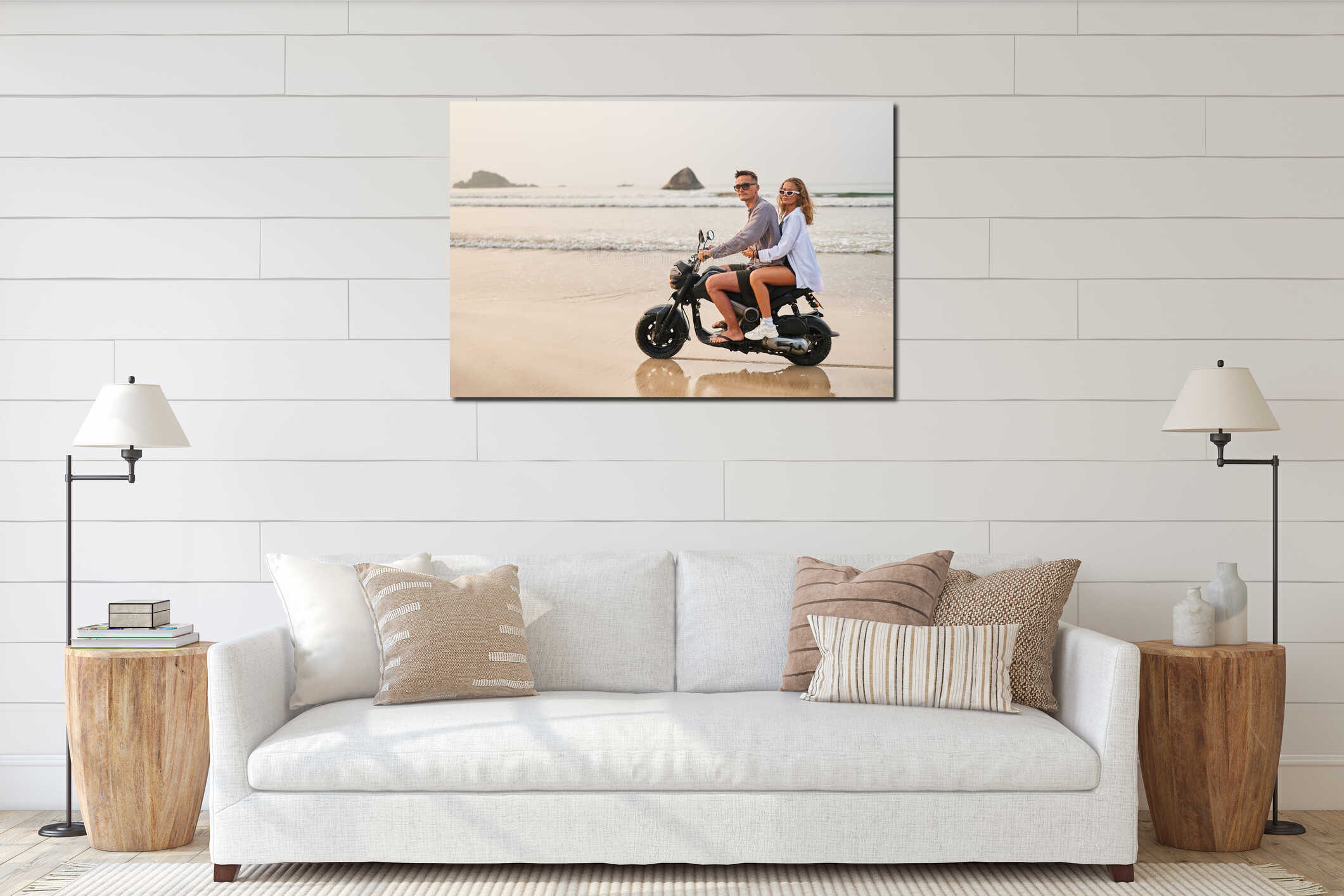 Couple rides scooter by ocean shore. Man drives, woman sits behind in sunglasses. They explore beach on motorbike during interior mockup
