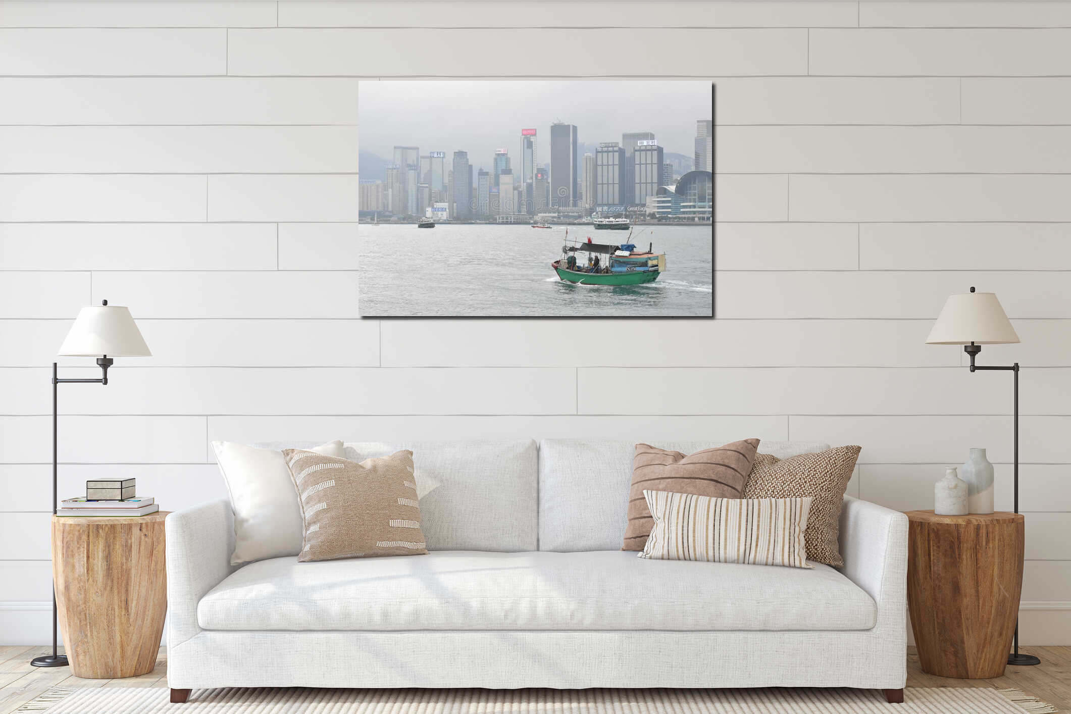 A small green fishing boat crosses the water of Hong Kong's Victoria Harbour interior mockup