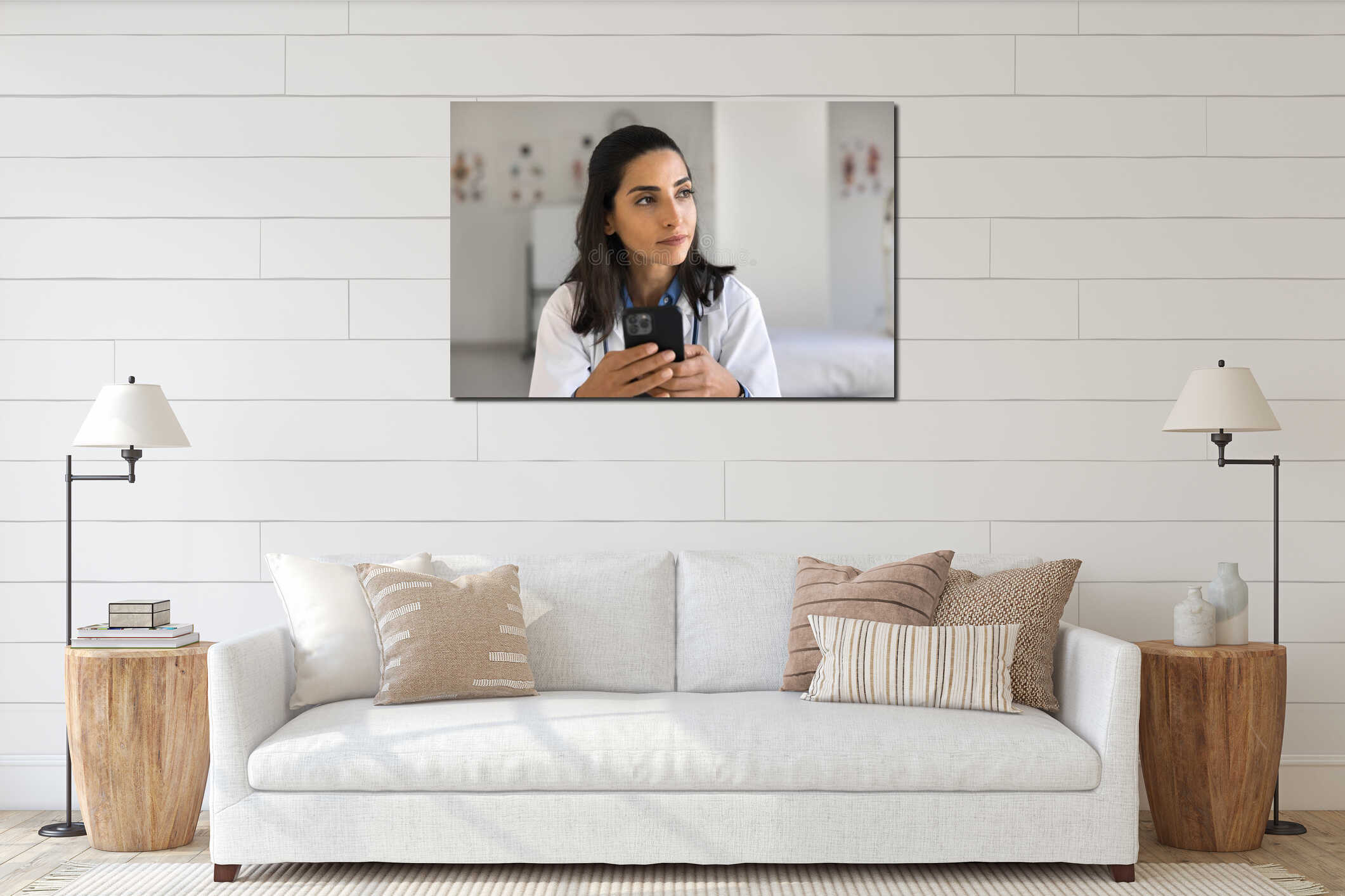 Thoughtful young woman doctor hold smartphone in hands look aside interior mockup