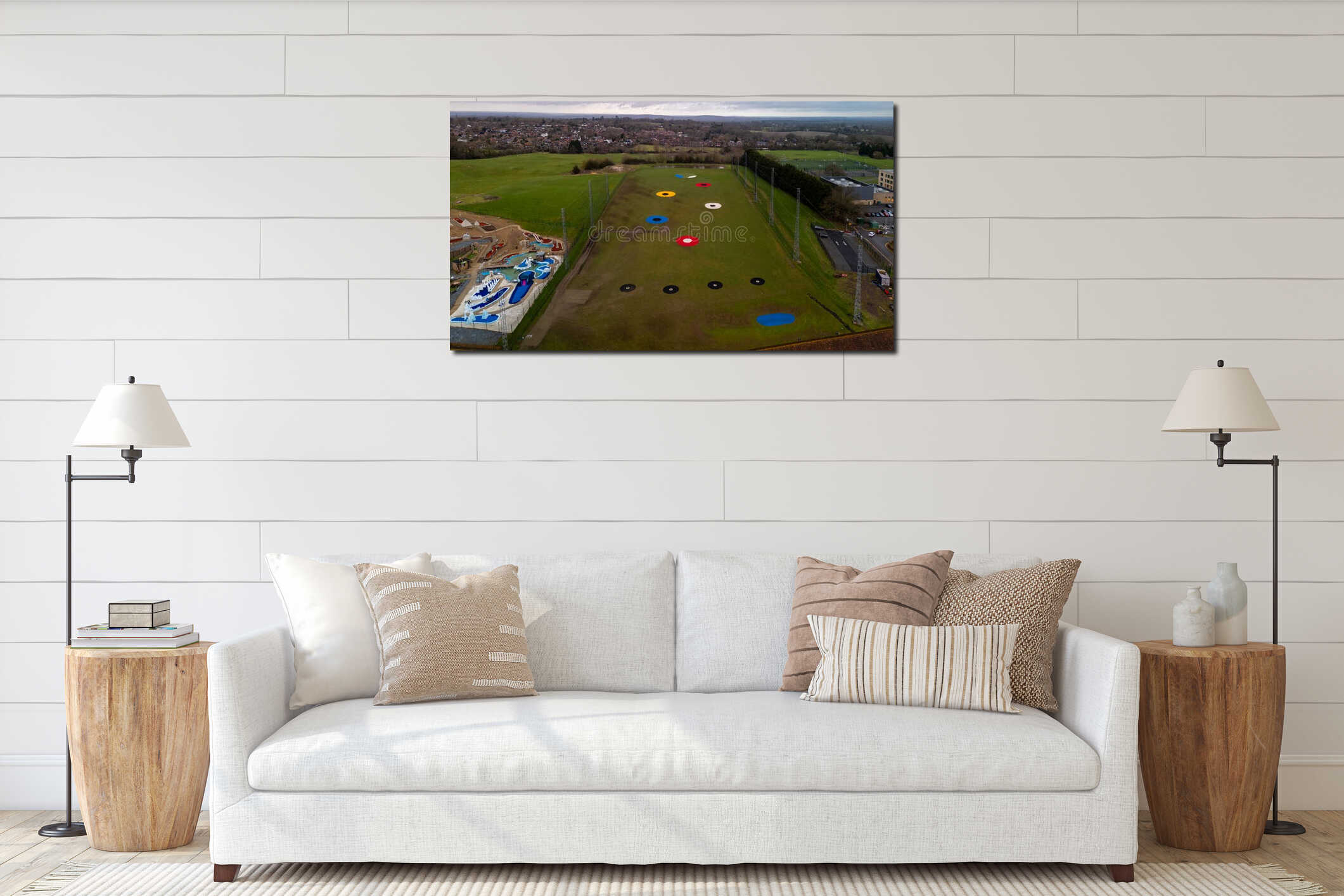 Aerial view of driving range with colorful targets and water park interior mockup