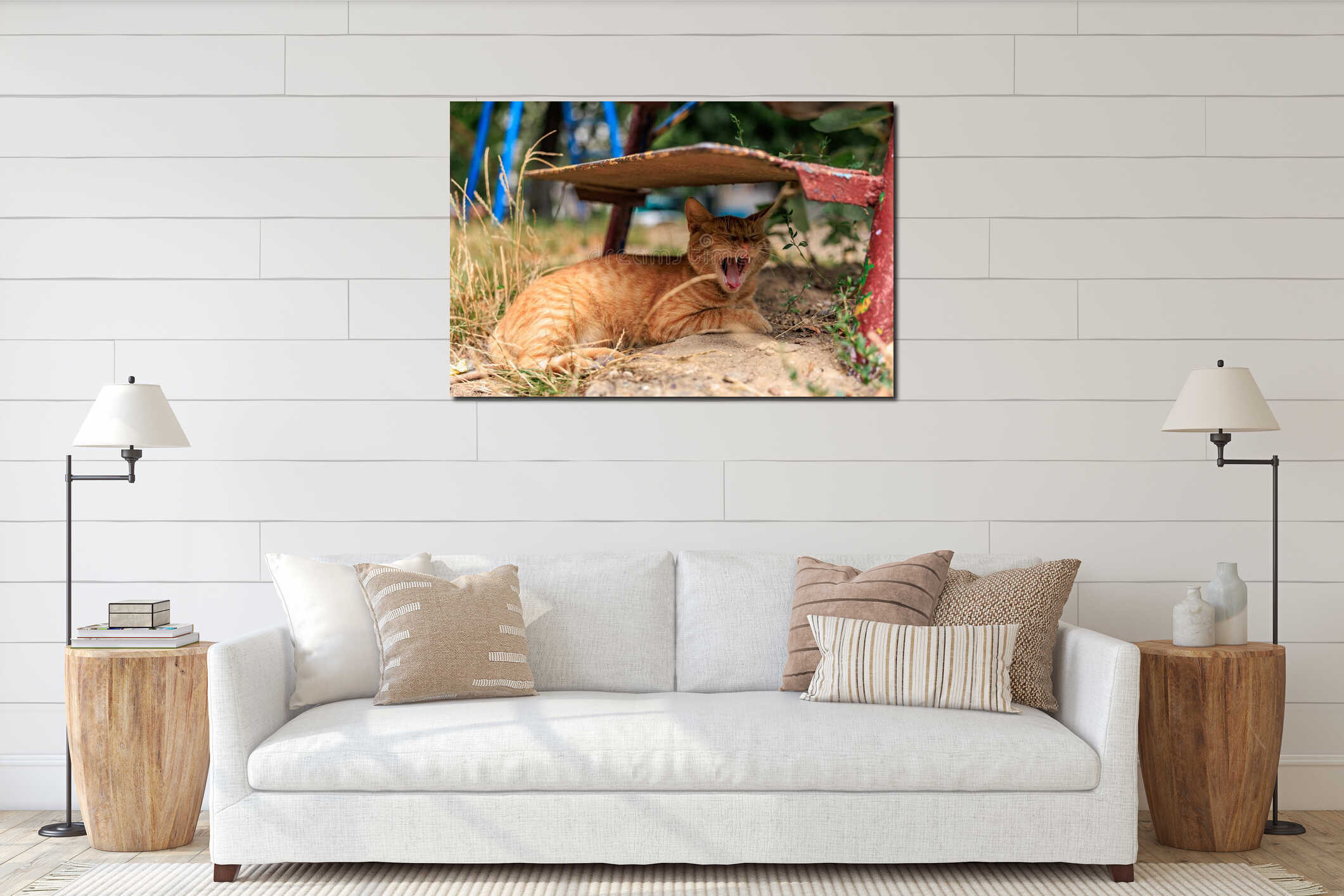 Yawning ginger cat relaxing under metal bench outdoors interior mockup