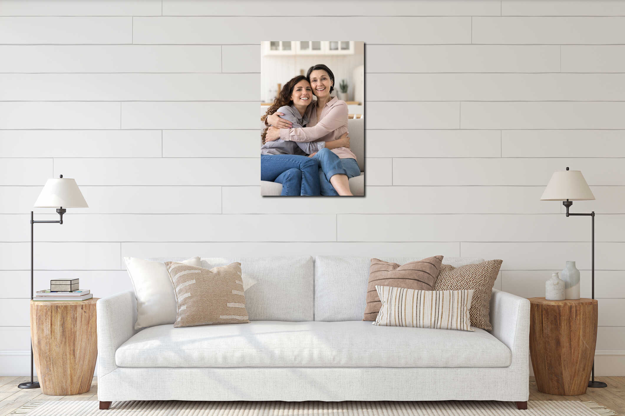 Young woman adult child hug aged mom sitting on sofa interior mockup