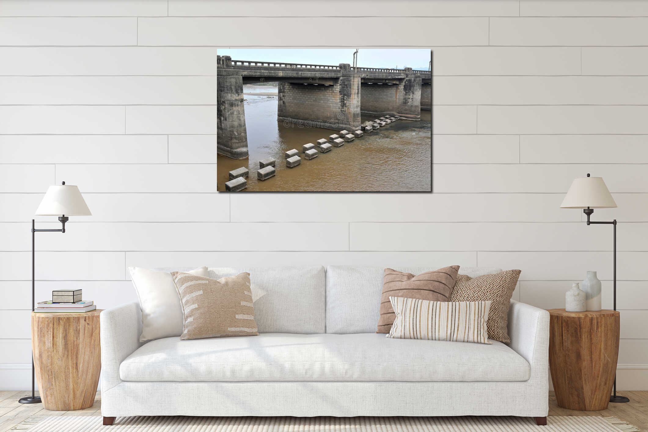 A concrete bridge spans across a muddy river, supported by large stone pillars. interior mockup
