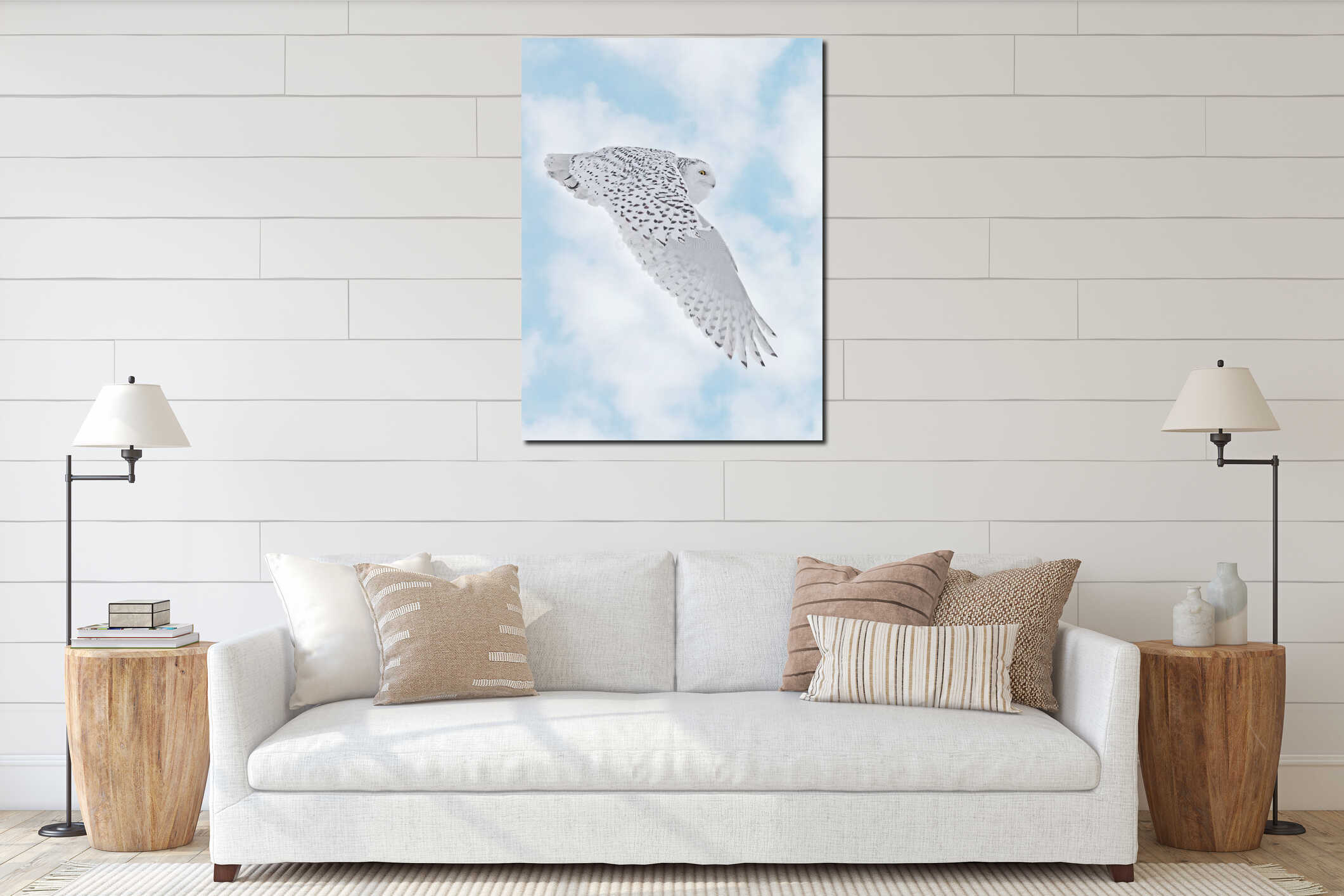 Snowy Owl female flying on a mixed clouds and blue sky background interior mockup