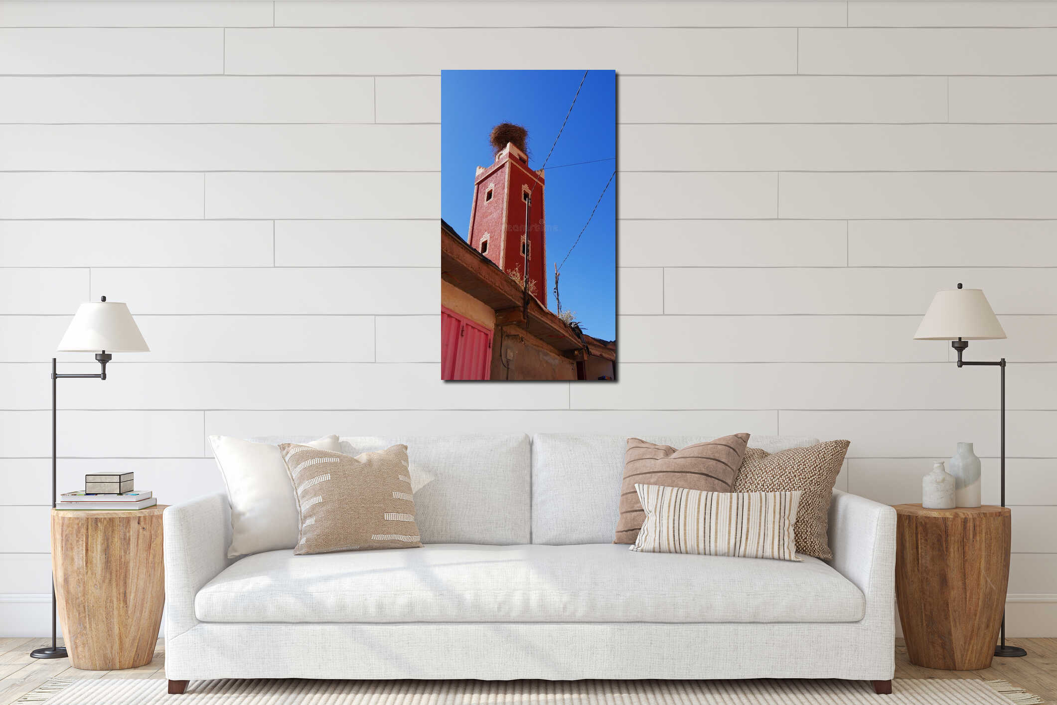 Orange Tower with Bird's Nest and Power Lines Above the Rooftops in the Atlas Mountains interior mockup