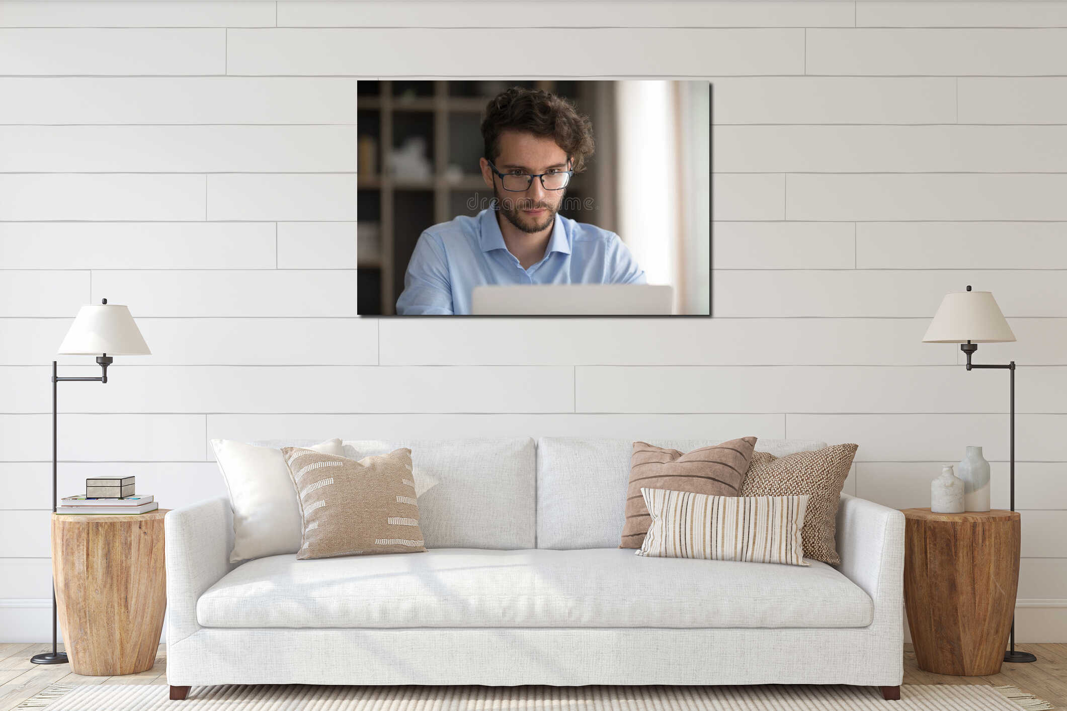 Closeup serious millennial man in glasses concentrated on notebook screen interior mockup