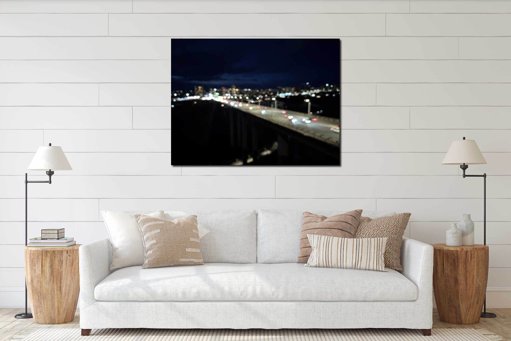 Blurred night view of the city with a view of the bridge and cars passing on an illuminated road interior mockup