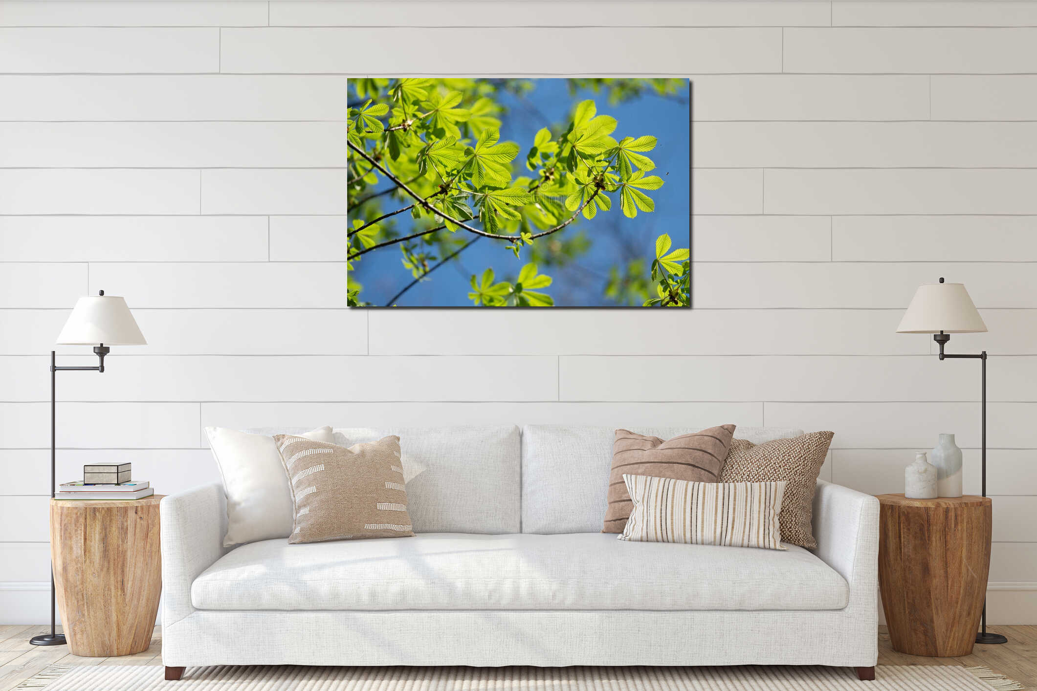 Bright green chestnut leaves against a blue sky in spring in the forest interior mockup
