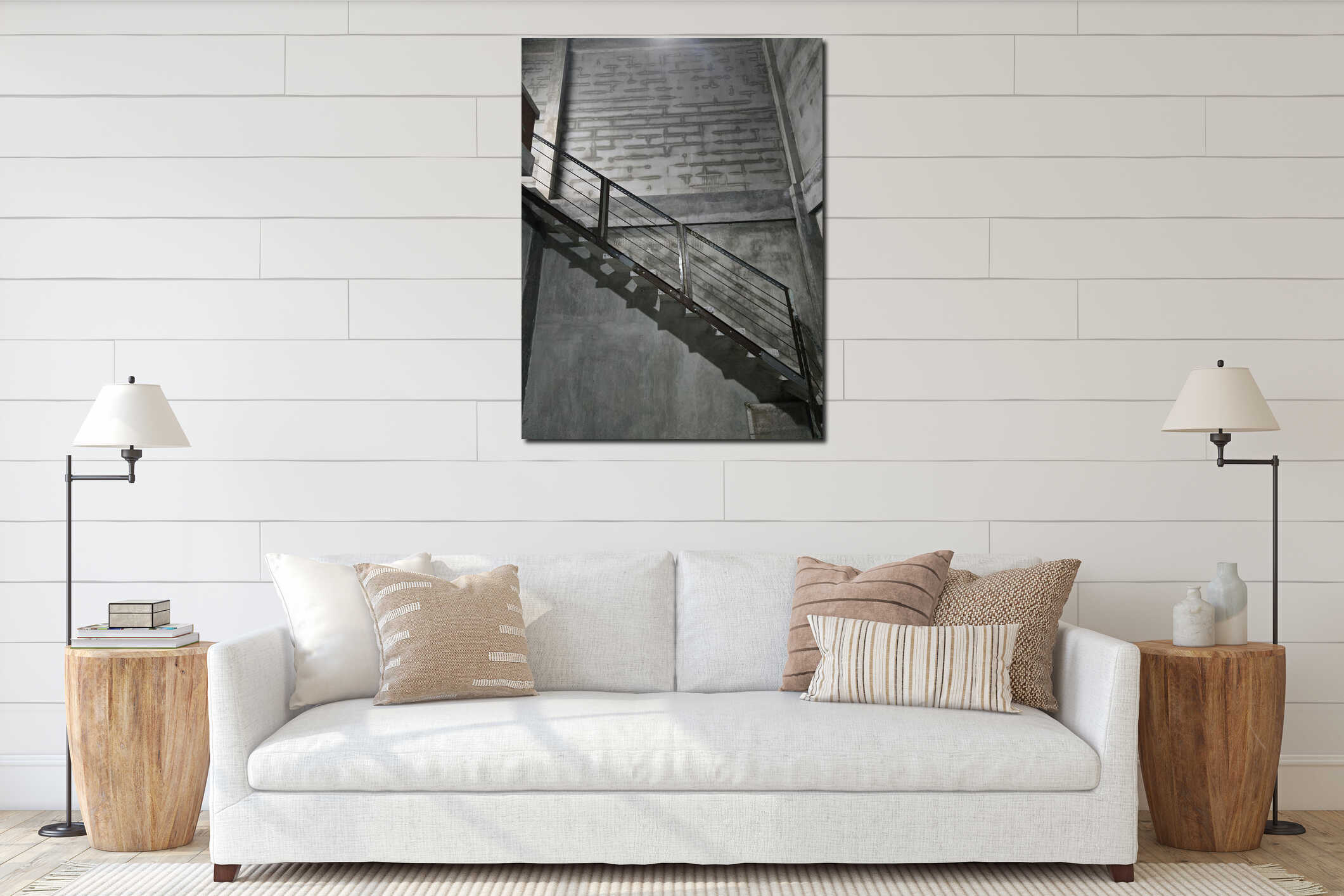 An empty concrete stairwell with a metal railing. Ideal for industrial, minimalist, or architectural photography. interior mockup