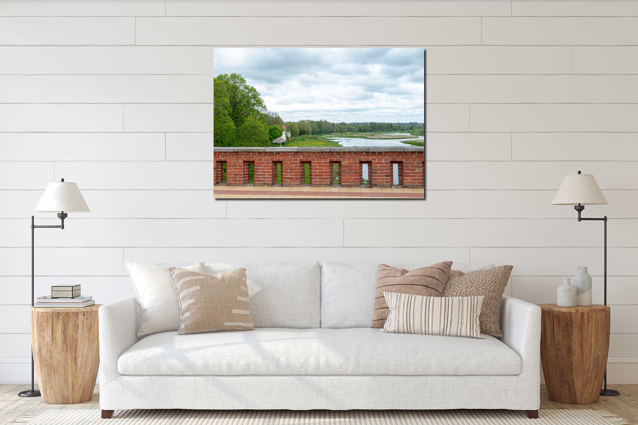 A seagull has gracefully perched on the railing of an old red brick bridge, blending natural serenity with historic architectur. interior mockup