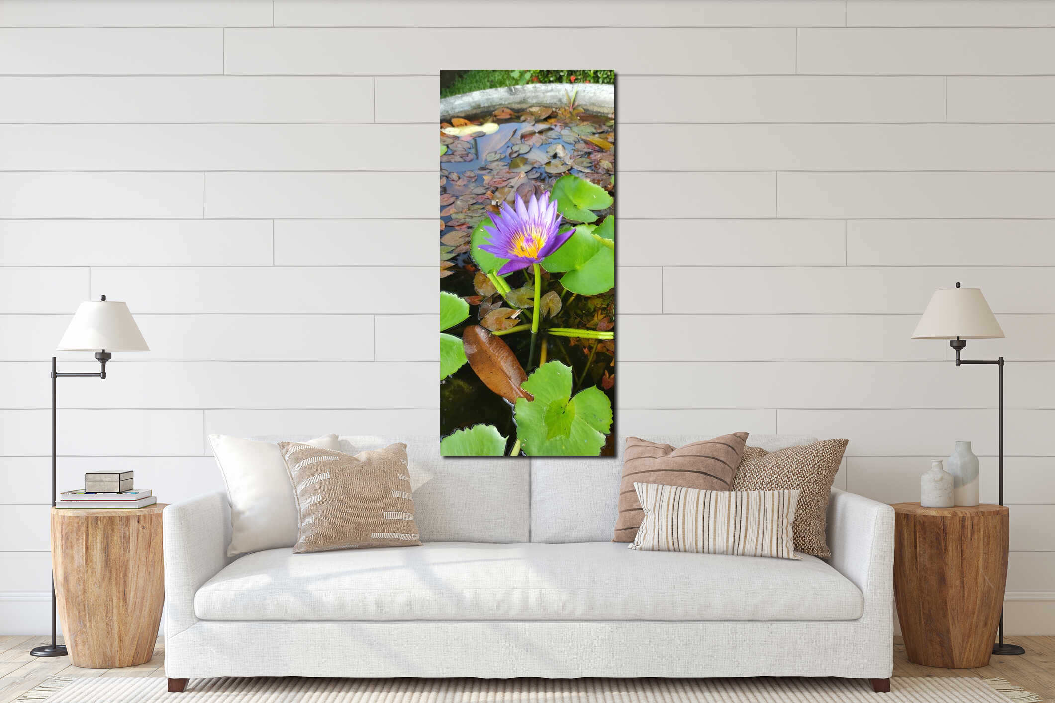 A vibrant purple water lily with a bright yellow center blooms in a pond, surrounded by green lily pads and floating leaves. interior mockup