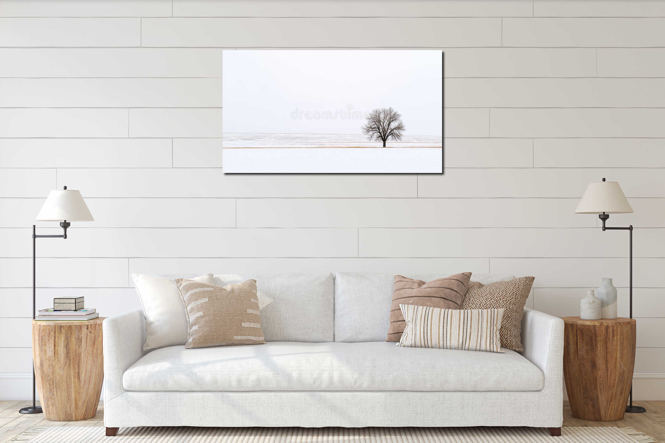 A lone tree stands in a snowy field. interior mockup
