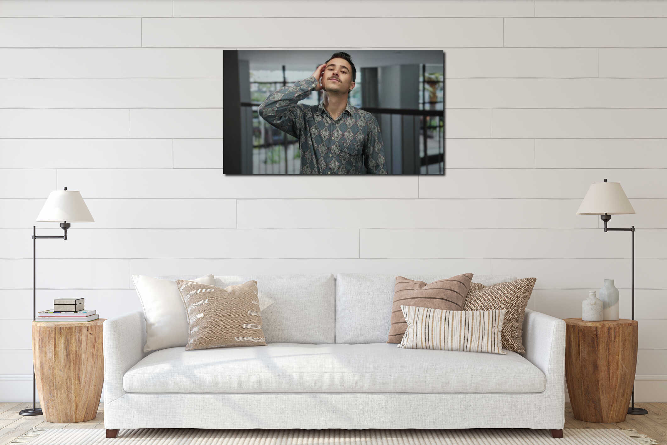 Young hispanic man standing confidently indoors in a modern hotel hallway, showcasing casual style and contemporary fashion interior mockup