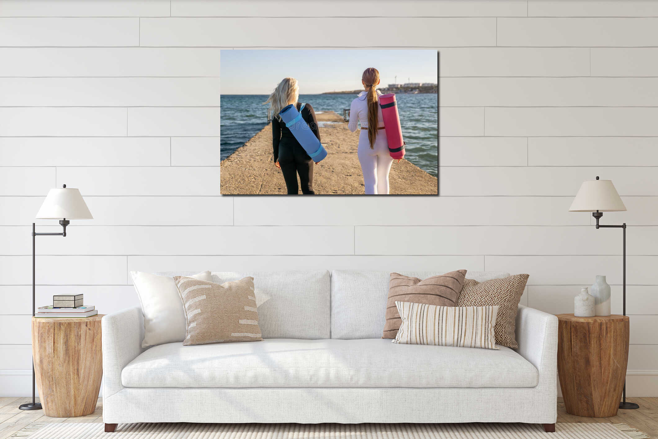 Women Yoga Mat Beach Walk - Two women walk along a pier towards the ocean carrying yoga mats, preparing for a seaside yoga session interior mockup