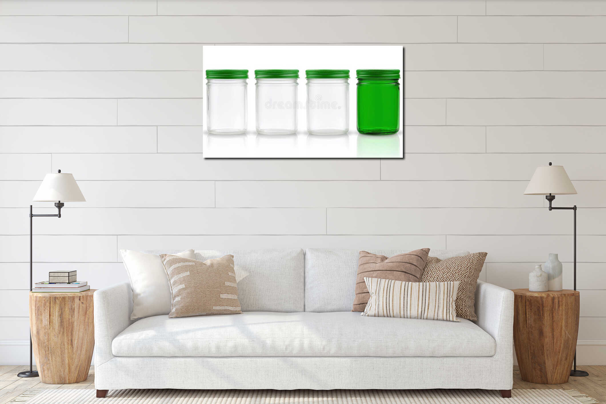 Four jars with green lids and clear glass bodies, arranged in a row. interior mockup