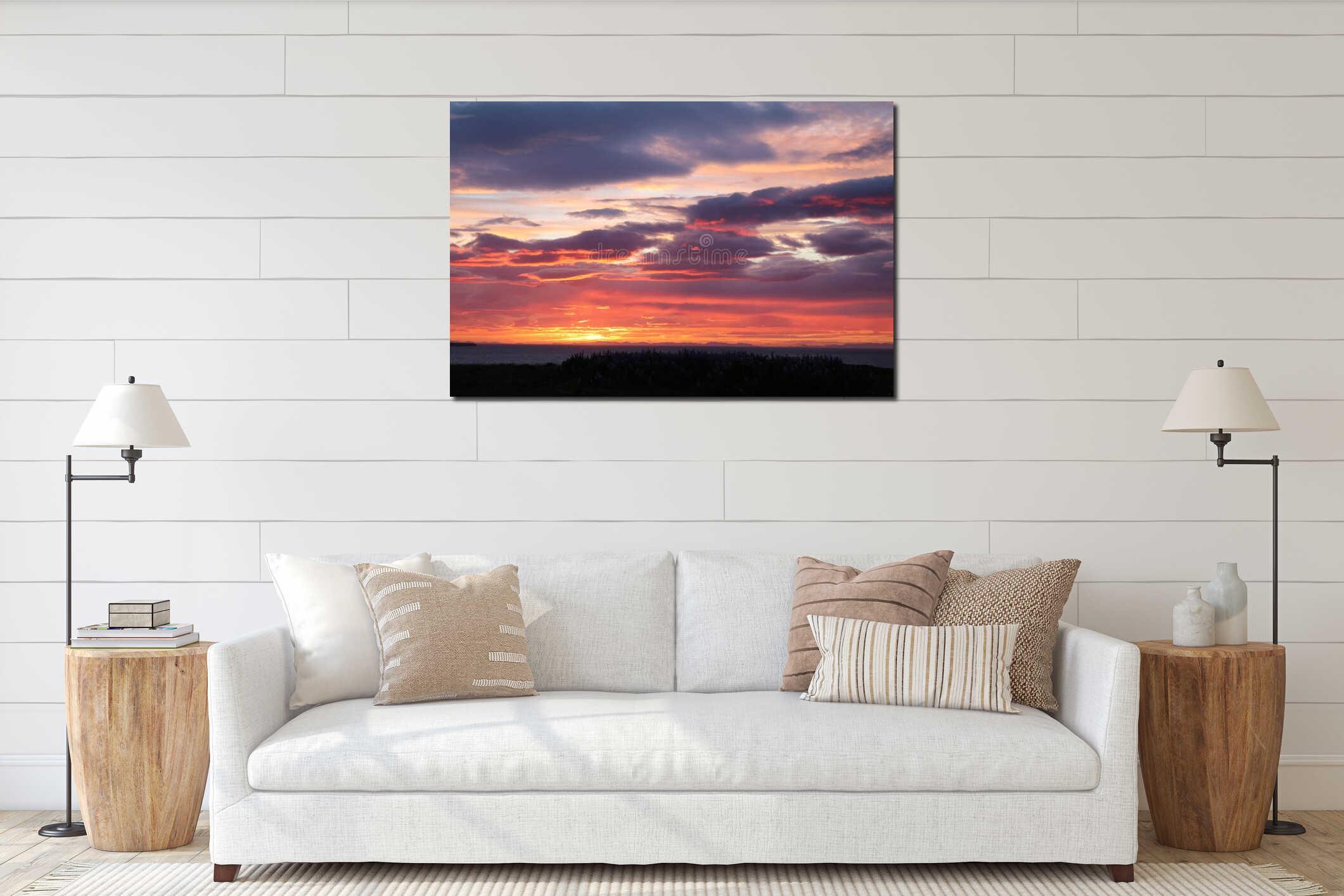 sunset with vibrant colors of orange, red and purple reflected in the clouds after a storm interior mockup