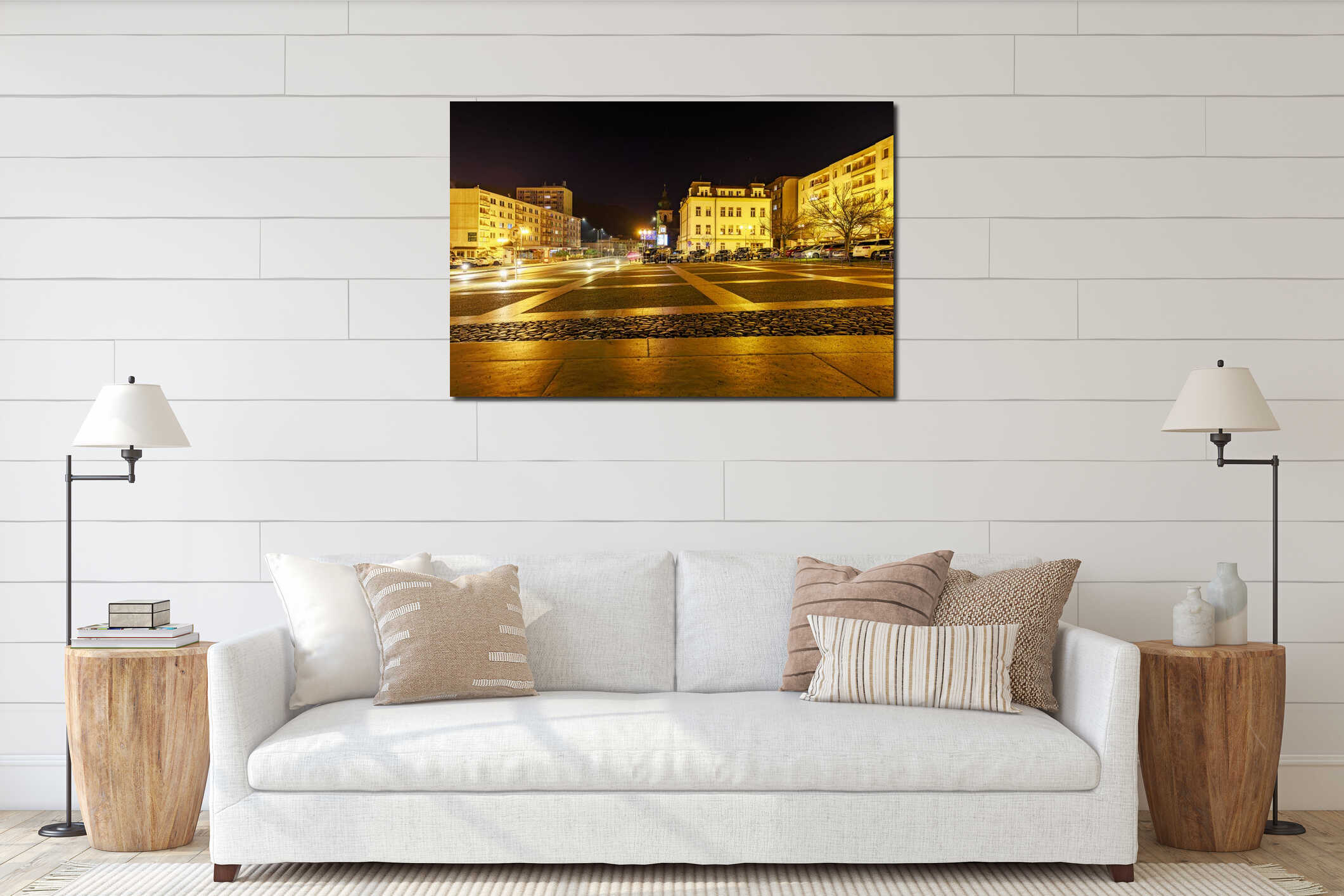 Nighttime urban cityscape with illuminated buildings and empty square. March 16, 2025, Decin, Czech Republic interior mockup