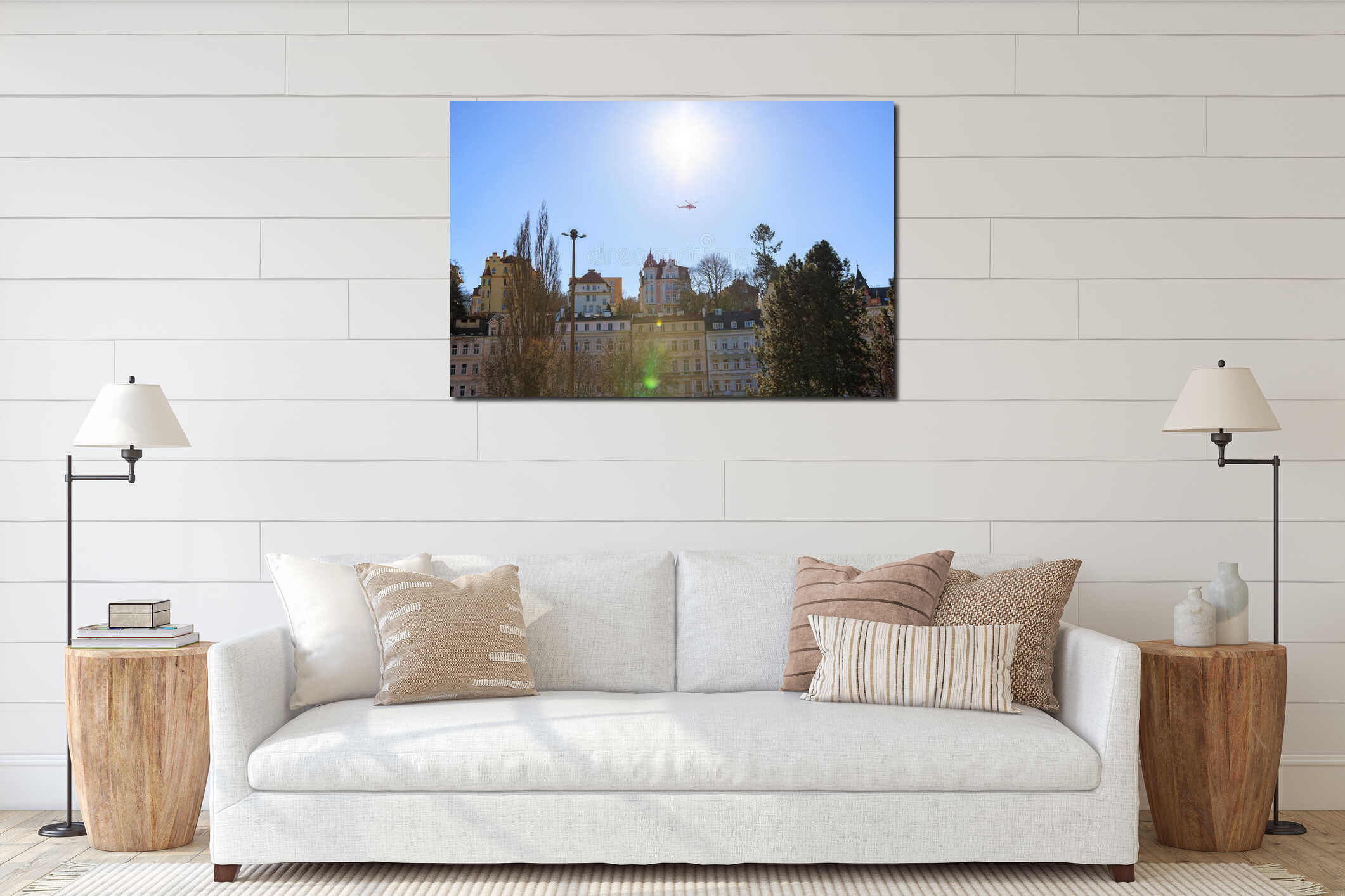 Sunny urban landscape with helicopter flying over colorful buildings and trees. March 18, 2025, Karlovy Vary, Czech Republic interior mockup