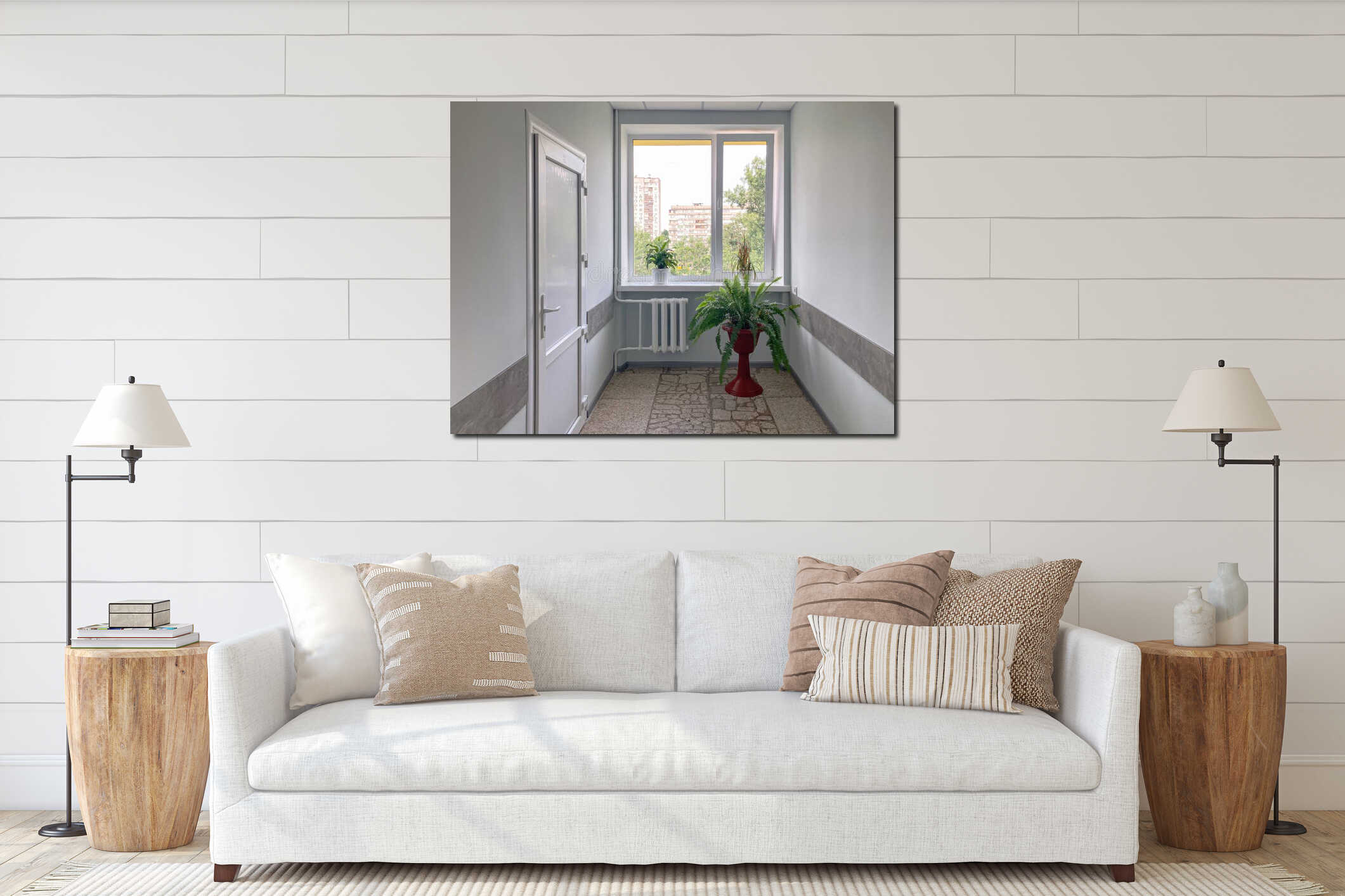 Neutral-toned, ordered hospital clinic hallway Beige walls with framed pictures, red planter with potted plant, transitioning interior mockup