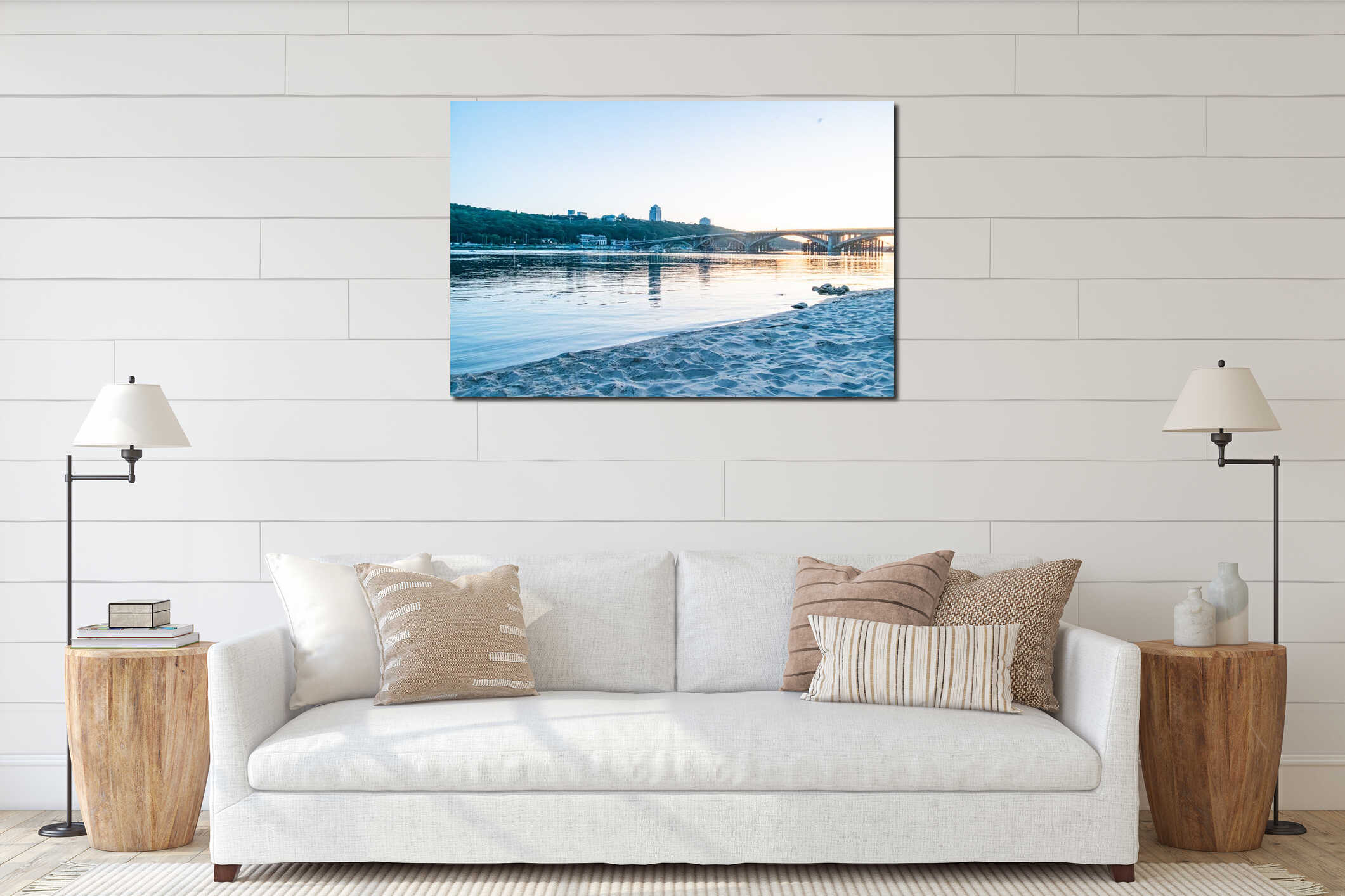 Wide-angle shot of a tranquil beach at sunsetsunrise, sandy shore with minimal tide movement, small rocks, natural rocky coastline interior mockup