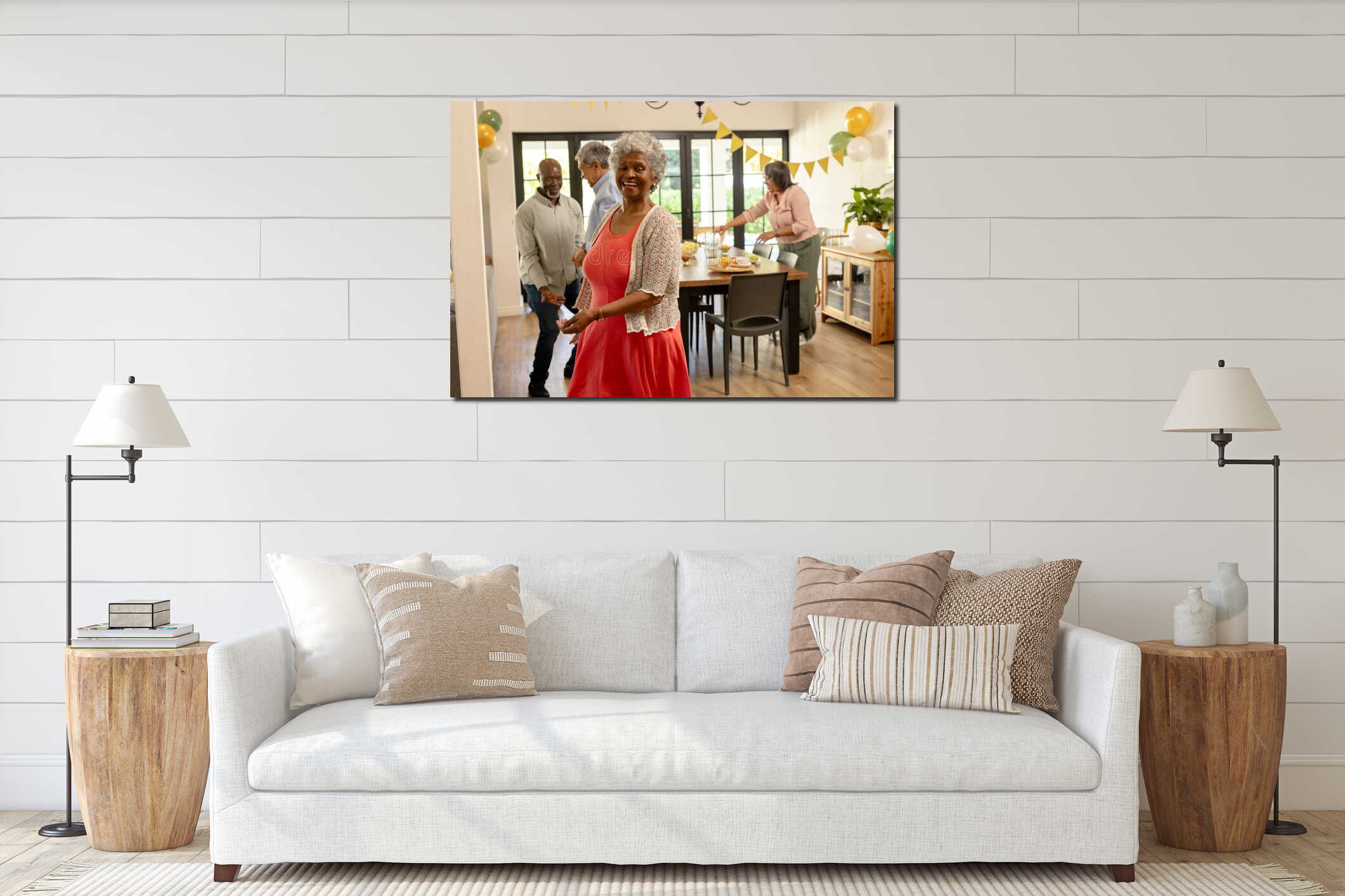 Celebrating at home, African American woman in red dress with friends, smiling joyfully interior mockup
