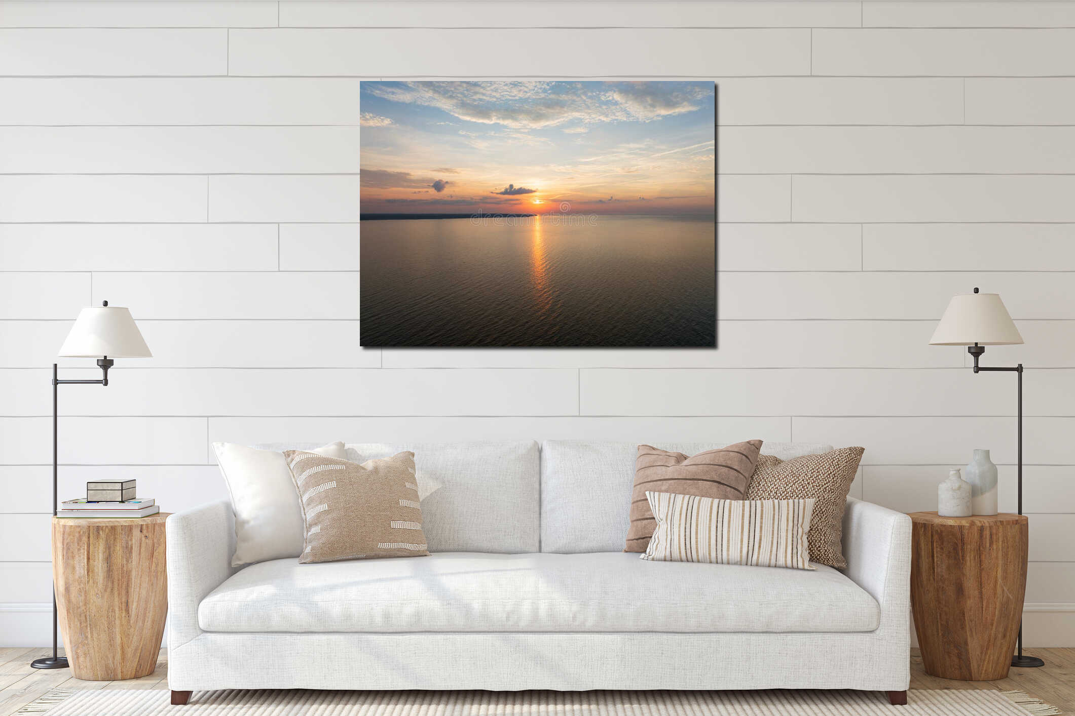 Stunning aerial panorama of a vibrant sunset reflecting on the Baltic Sea with the silhouetted coastline of Estonia interior mockup