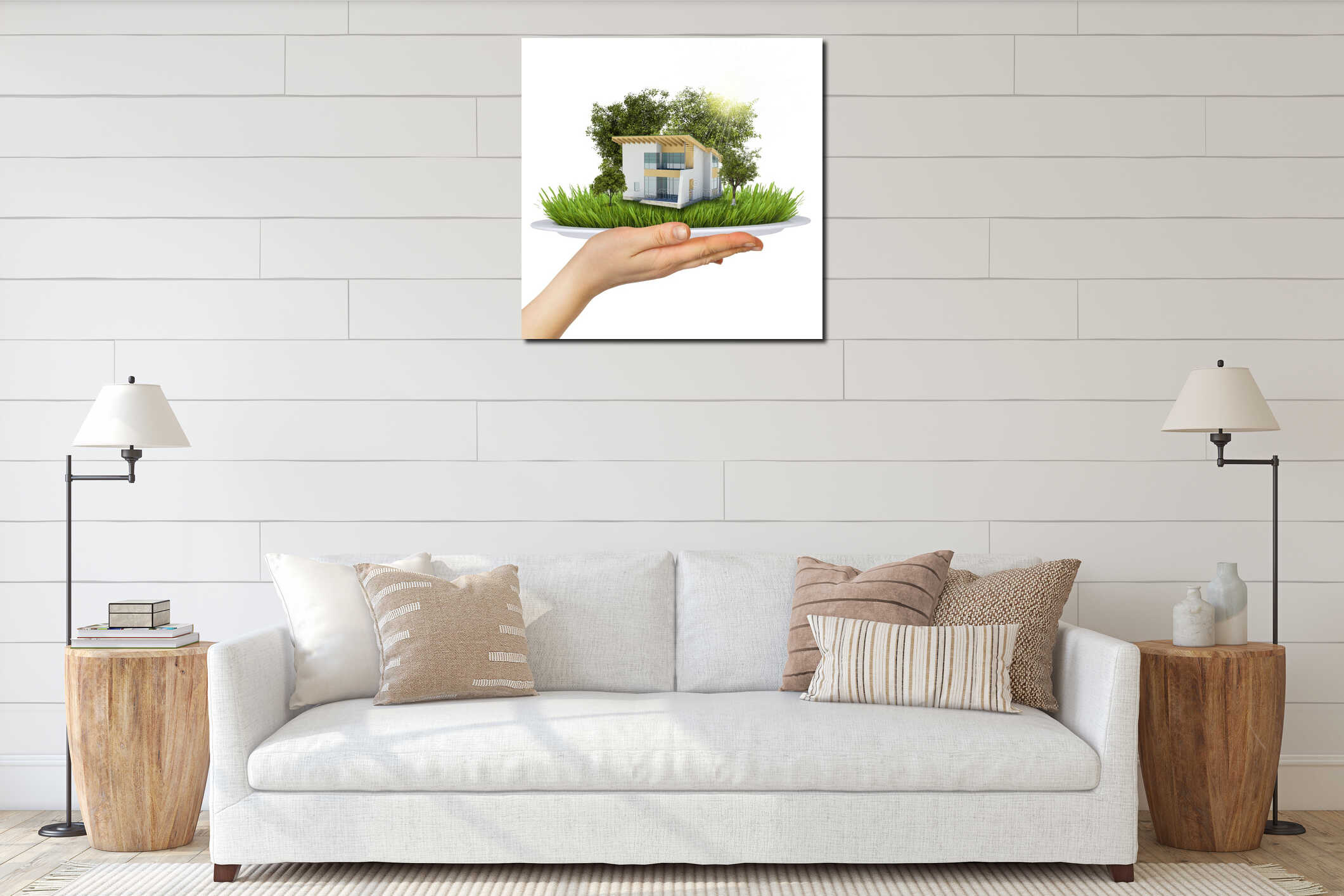 Hand holds a plate. On the plate is a small house interior mockup