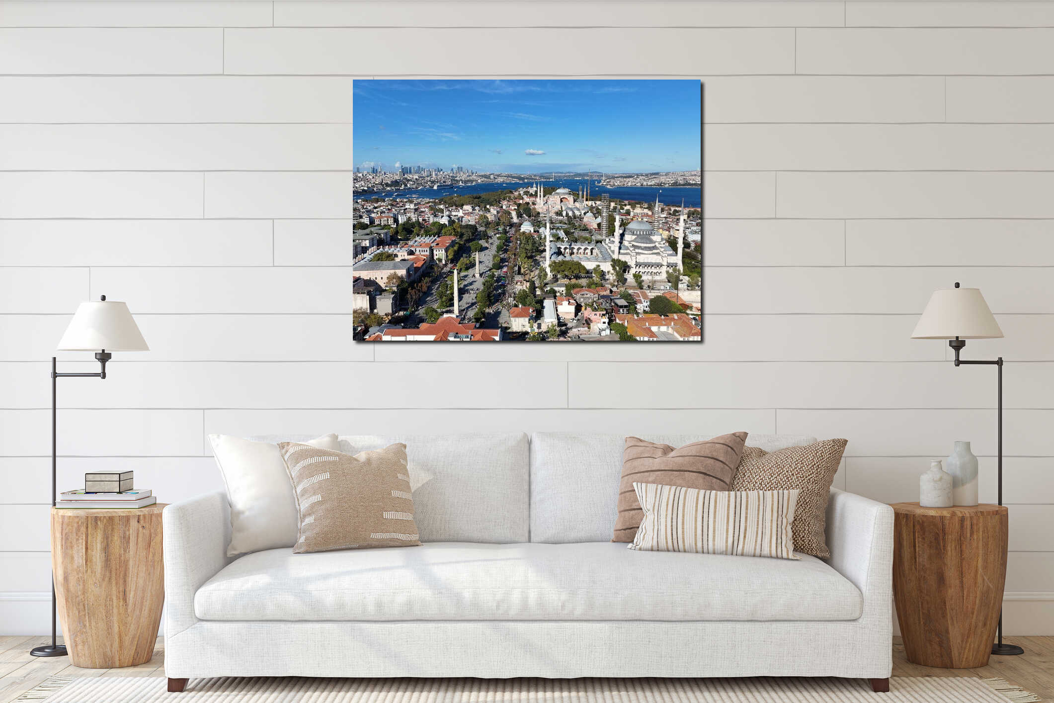 Aerial view of Istanbul showcasing the Hagia Sophia, Blue Mosque, and Bosphorus under a blue sky. interior mockup