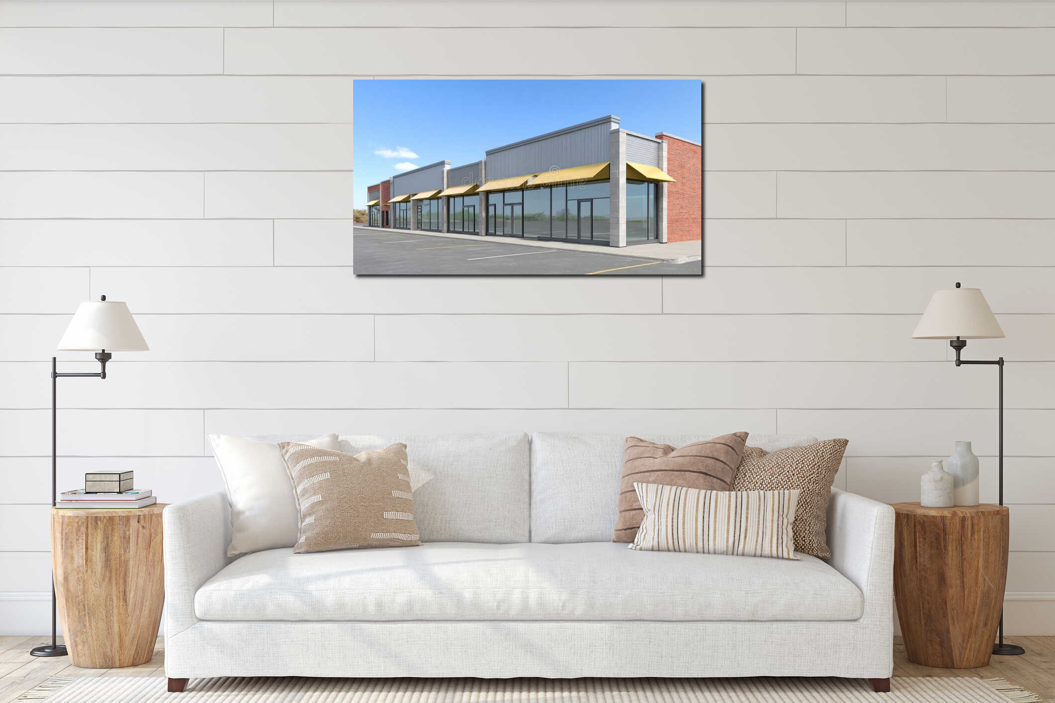 A modern retail building constructed from brick is characterized by its large windows and generous parking area on a interior mockup