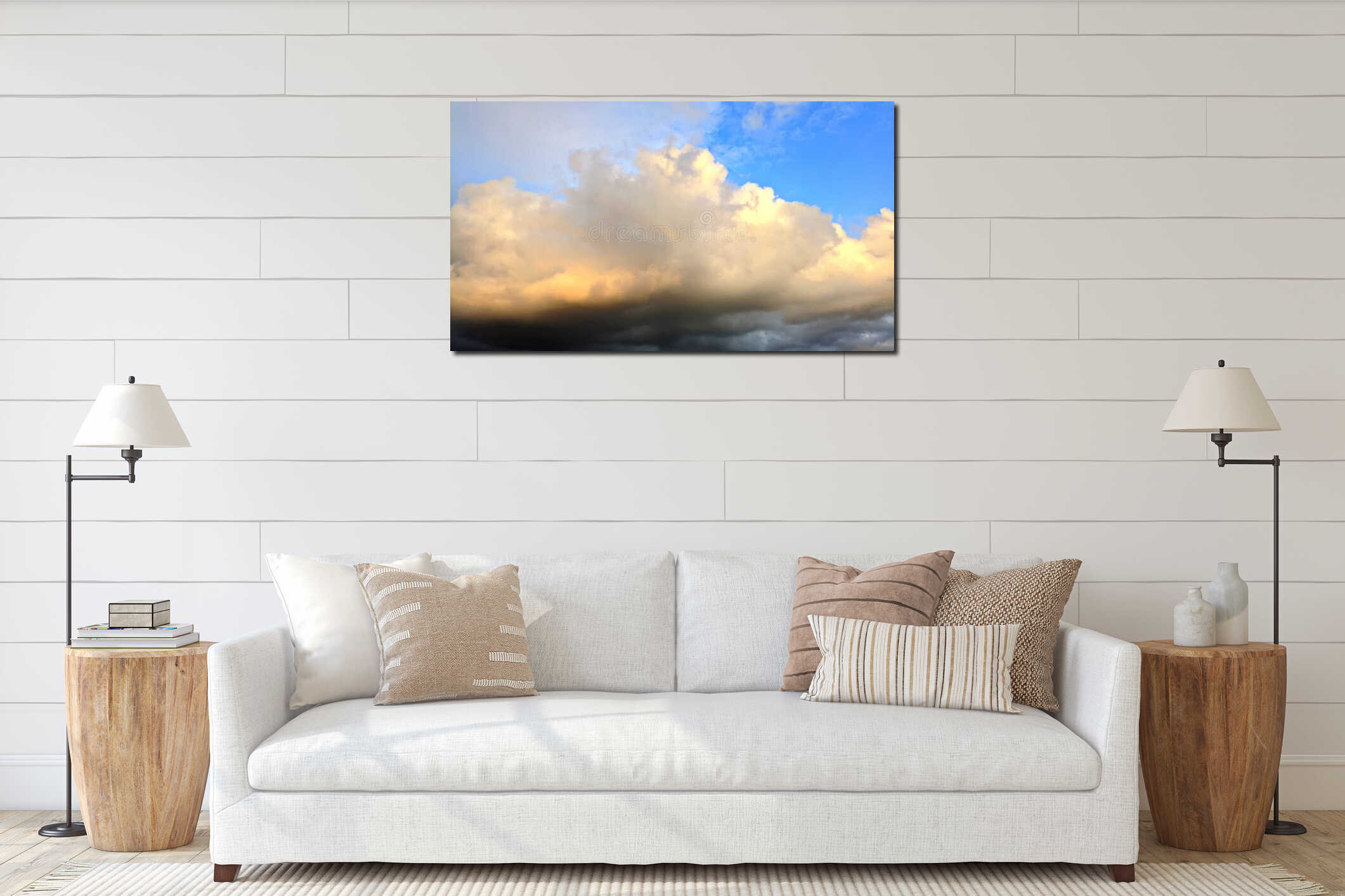 Dramatic cloudy sky with soft golden sunlight breaking through layers of thick evening clouds interior mockup